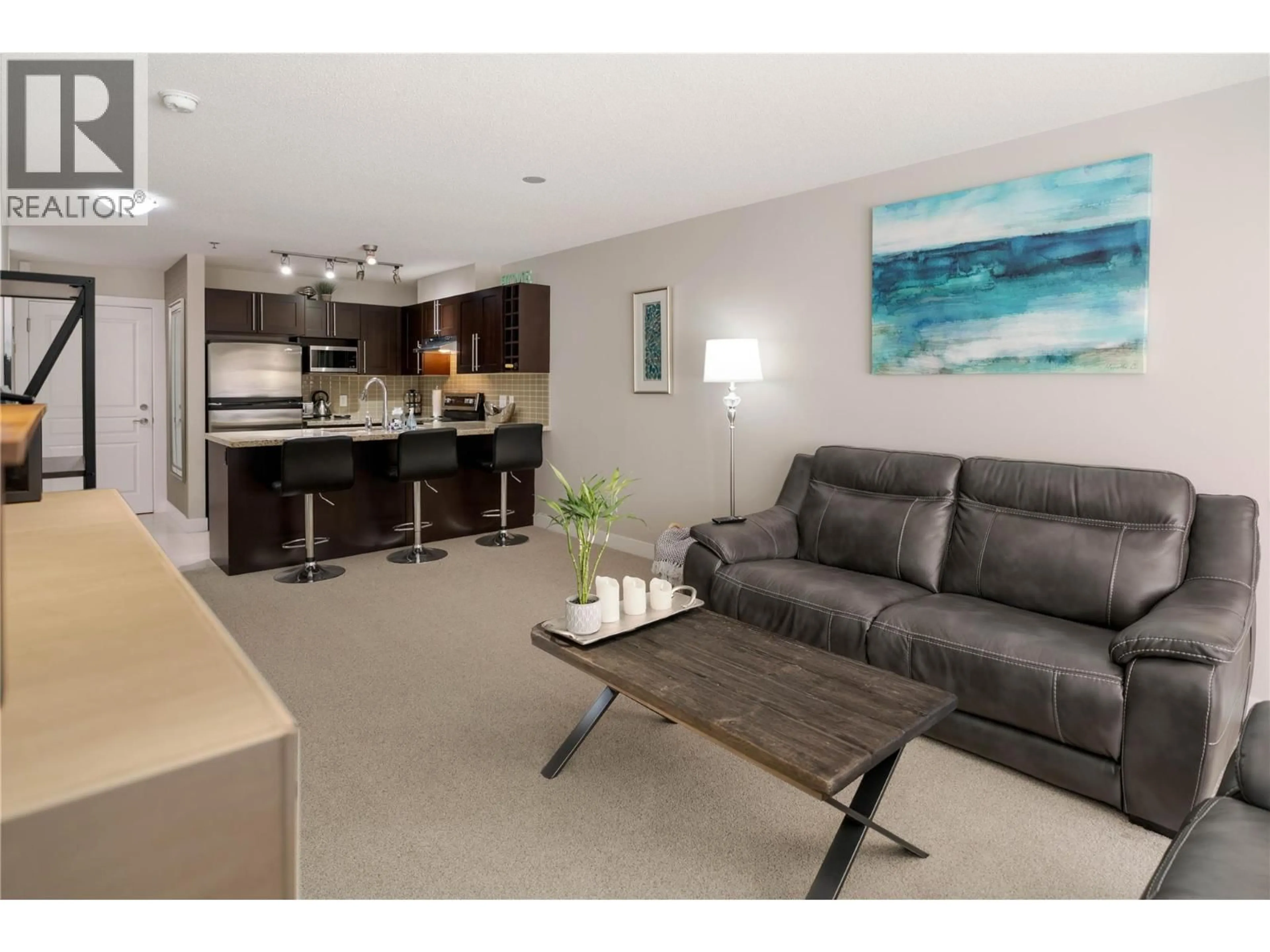 Living room with furniture, unknown for 312 - 1083 SUNSET DRIVE, Kelowna British Columbia V1Y9Z1