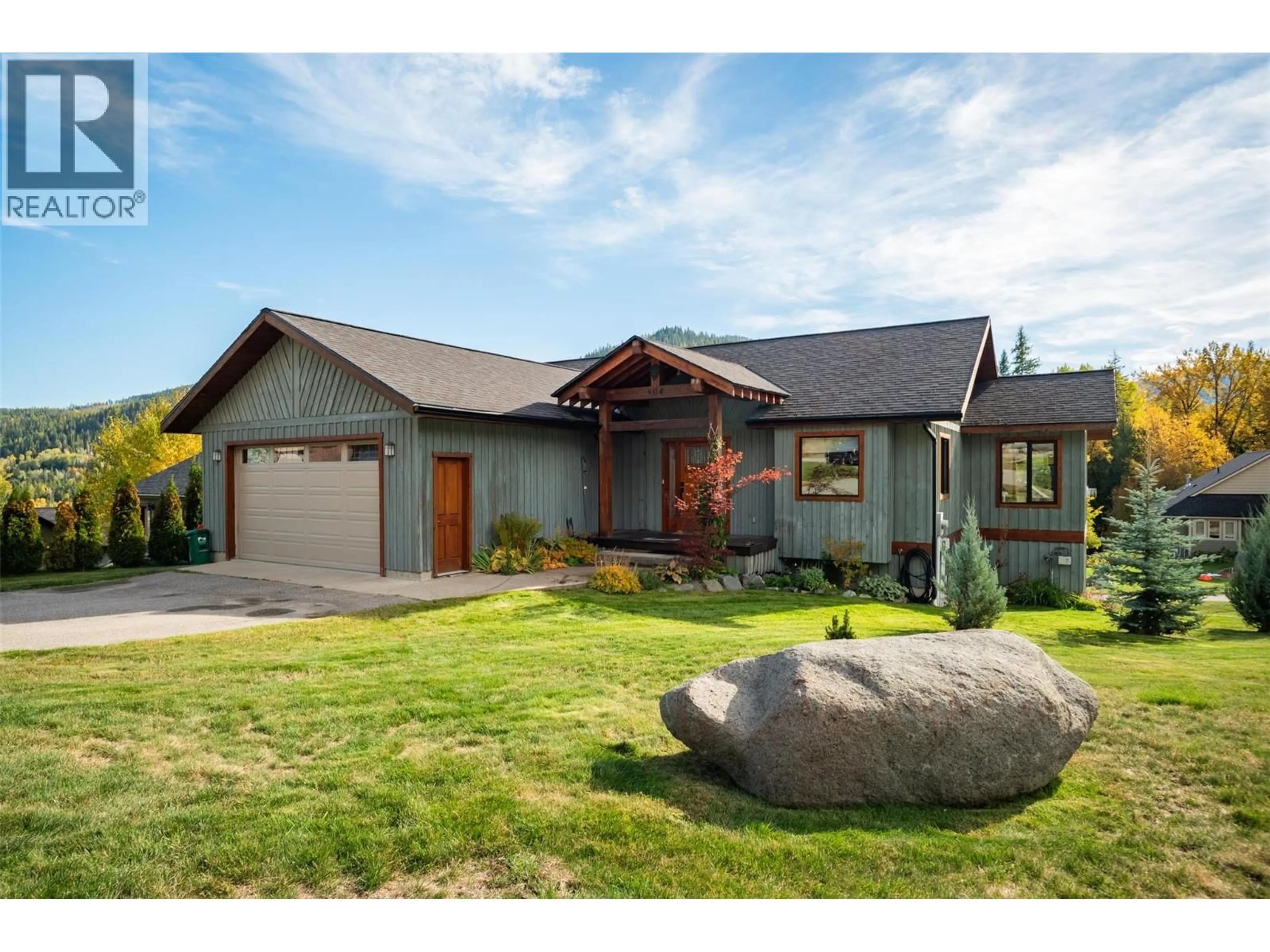 Home with vinyl exterior material, street for 904 REDSTONE DRIVE, Rossland British Columbia V0G1Y0