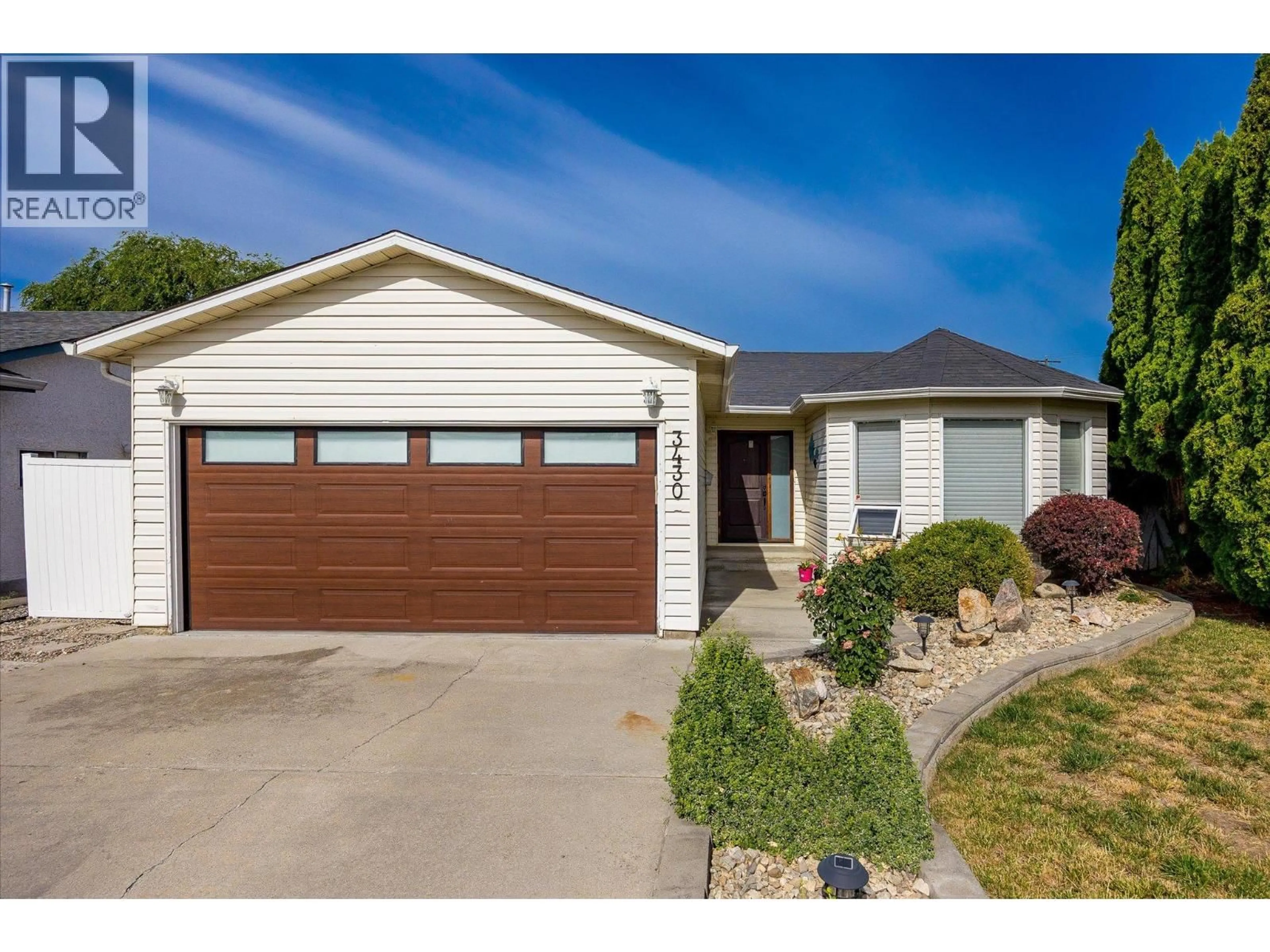 Home with vinyl exterior material, street for 3430 SILVERBERRY ROAD, Kelowna British Columbia V1W3V5