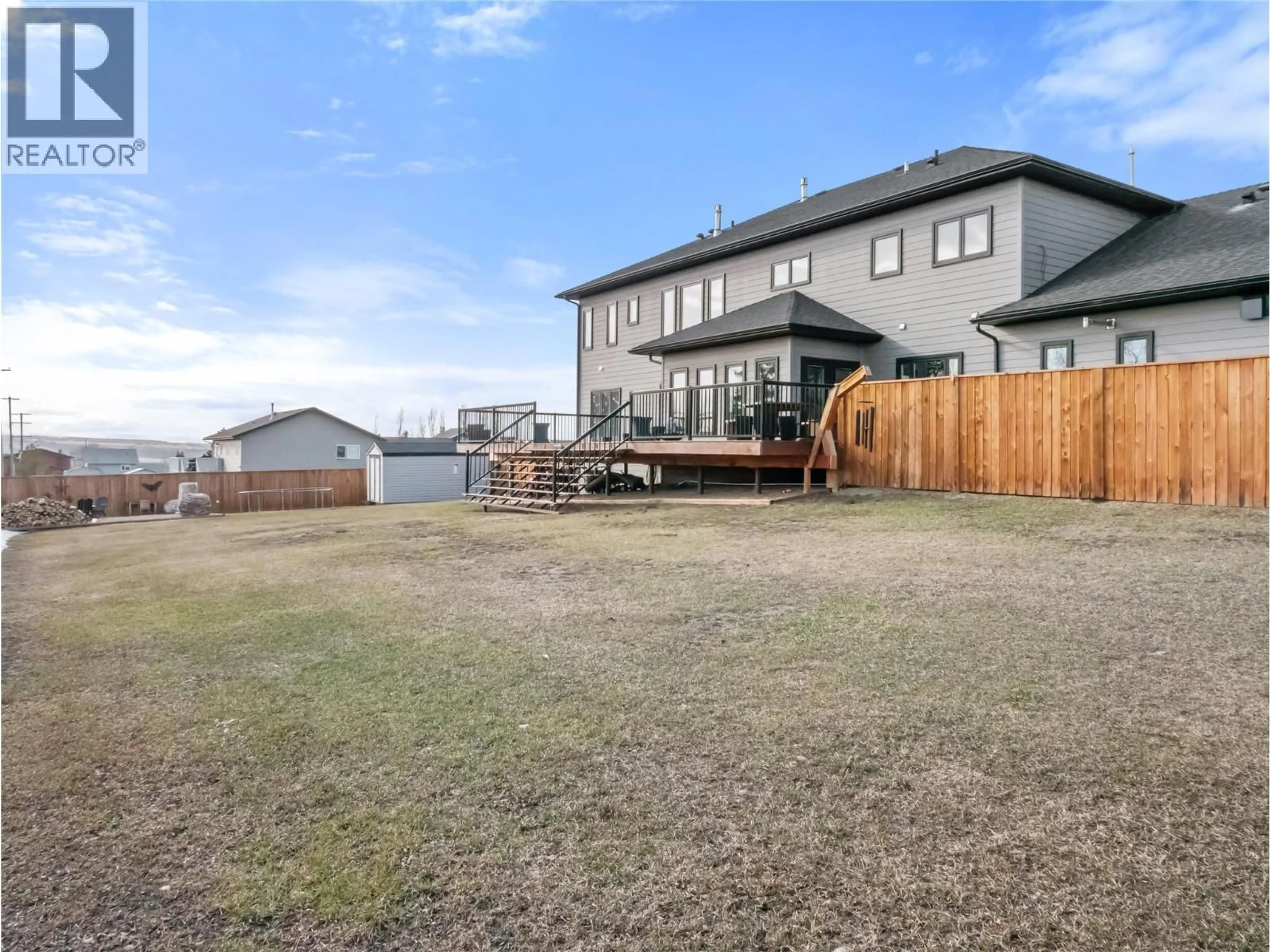 A pic from outside/outdoor area/front of a property/back of a property/a pic from drone, unknown for 1905 89 AVENUE, Dawson Creek British Columbia V1G0A2