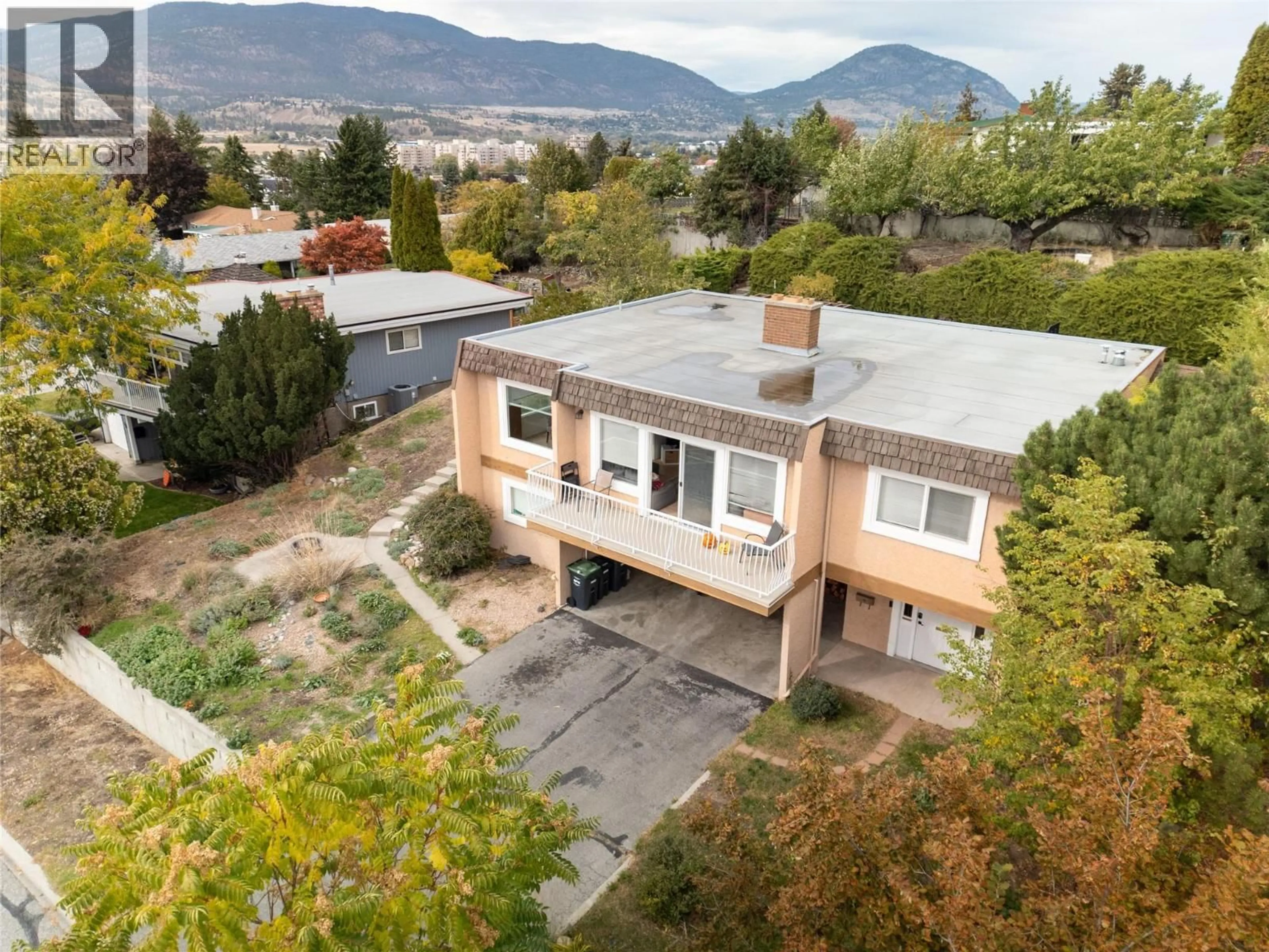 A pic from outside/outdoor area/front of a property/back of a property/a pic from drone, mountain view for 190 DAFOE PLACE, Penticton British Columbia V2A7E6