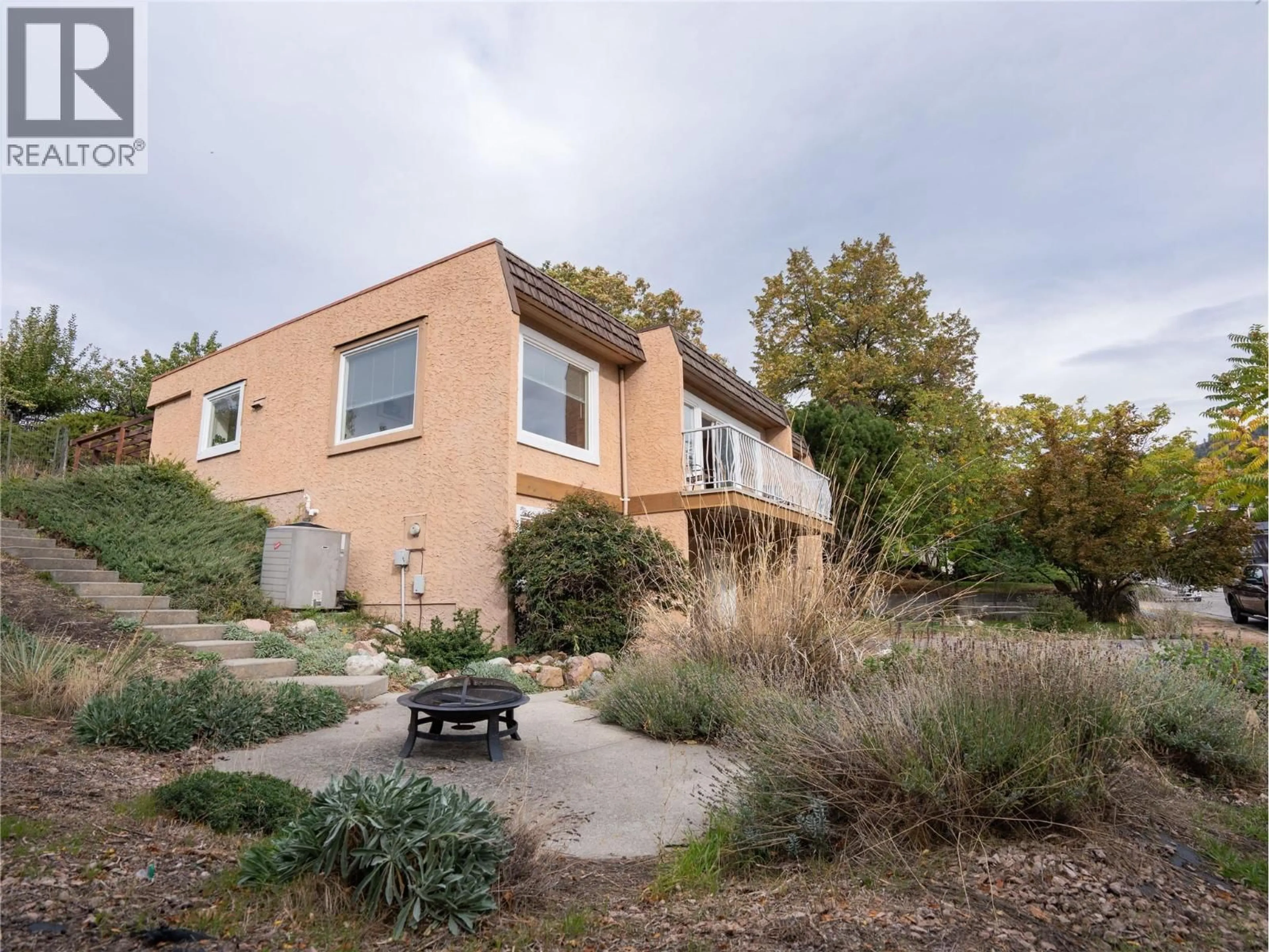 A pic from outside/outdoor area/front of a property/back of a property/a pic from drone, unknown for 190 DAFOE PLACE, Penticton British Columbia V2A7E6
