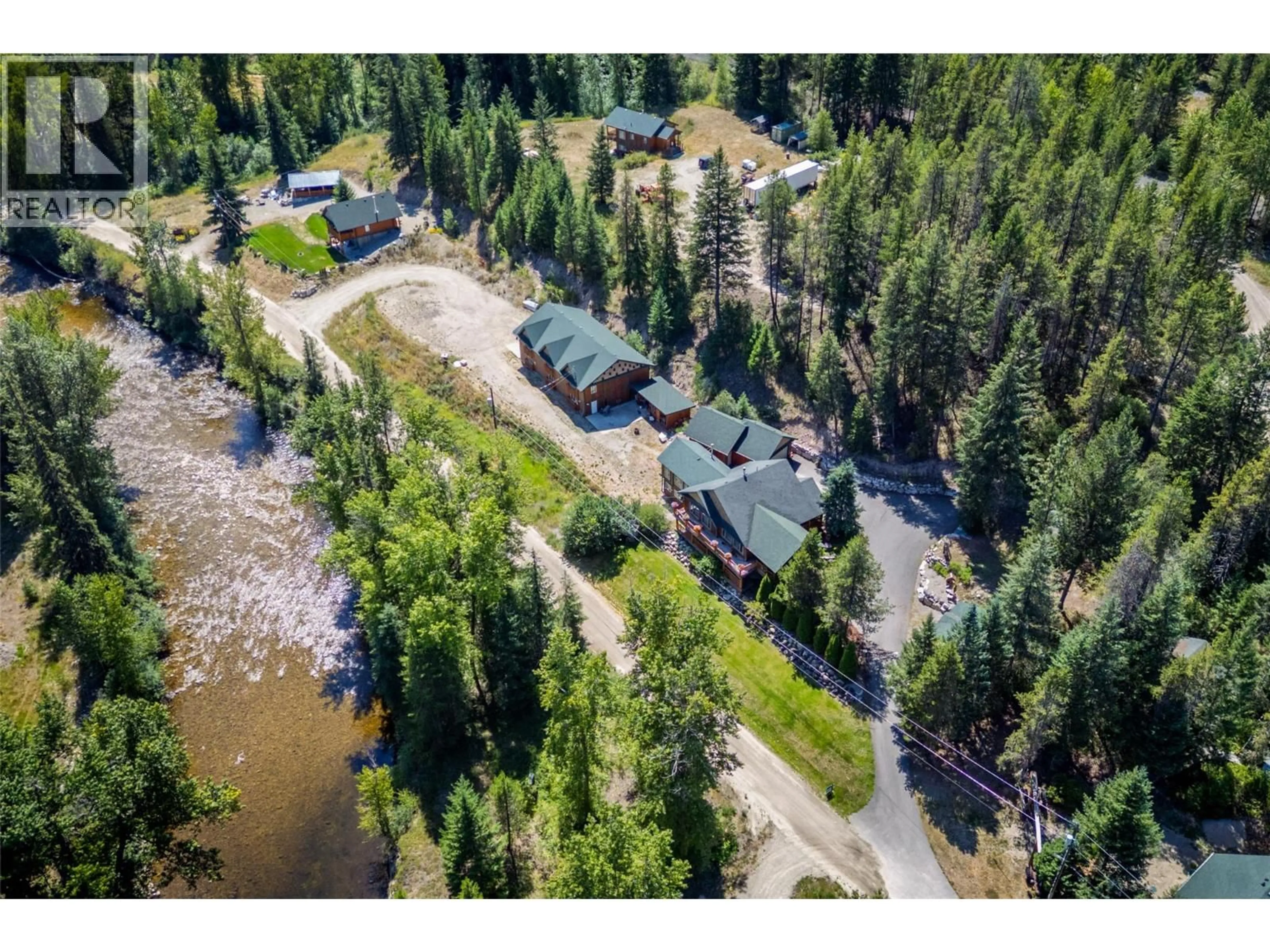 A pic from outside/outdoor area/front of a property/back of a property/a pic from drone, water/lake/river/ocean view for 95 & 105 DALE AVENUE, Carmi British Columbia V0H1A0