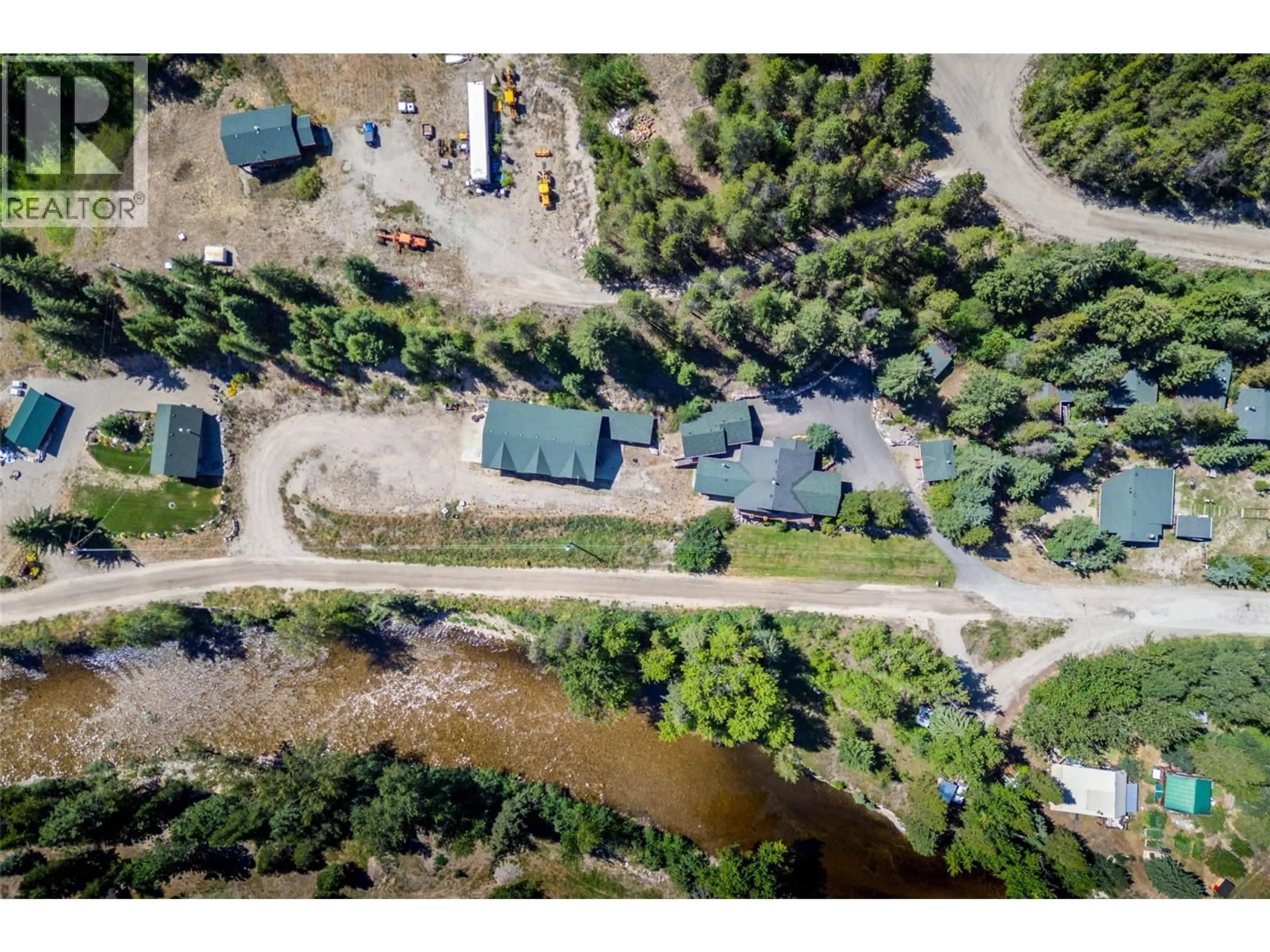 A pic from outside/outdoor area/front of a property/back of a property/a pic from drone, water/lake/river/ocean view for 95 & 105 DALE AVENUE, Carmi British Columbia V0H1A0