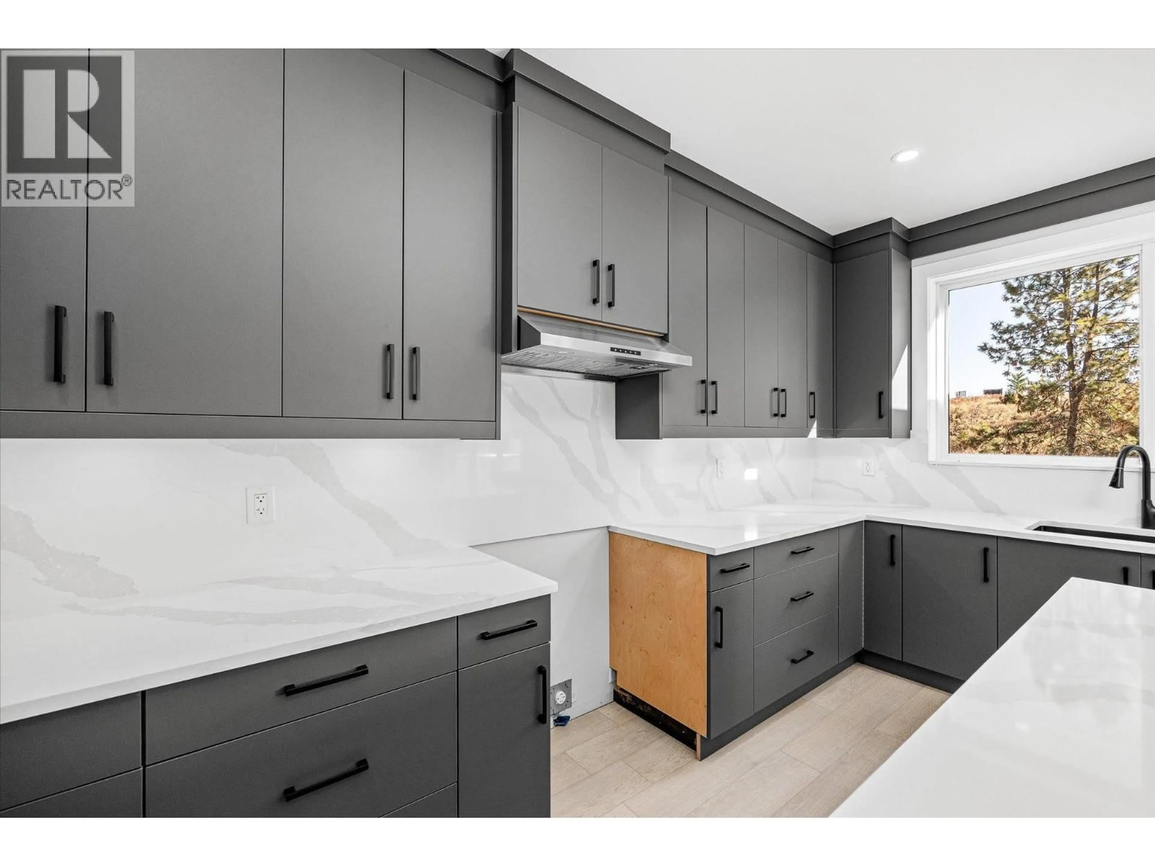 Contemporary kitchen, ceramic/tile floor for 1675 HARBOUR VIEW CRESCENT, West Kelowna British Columbia V1Z4E1