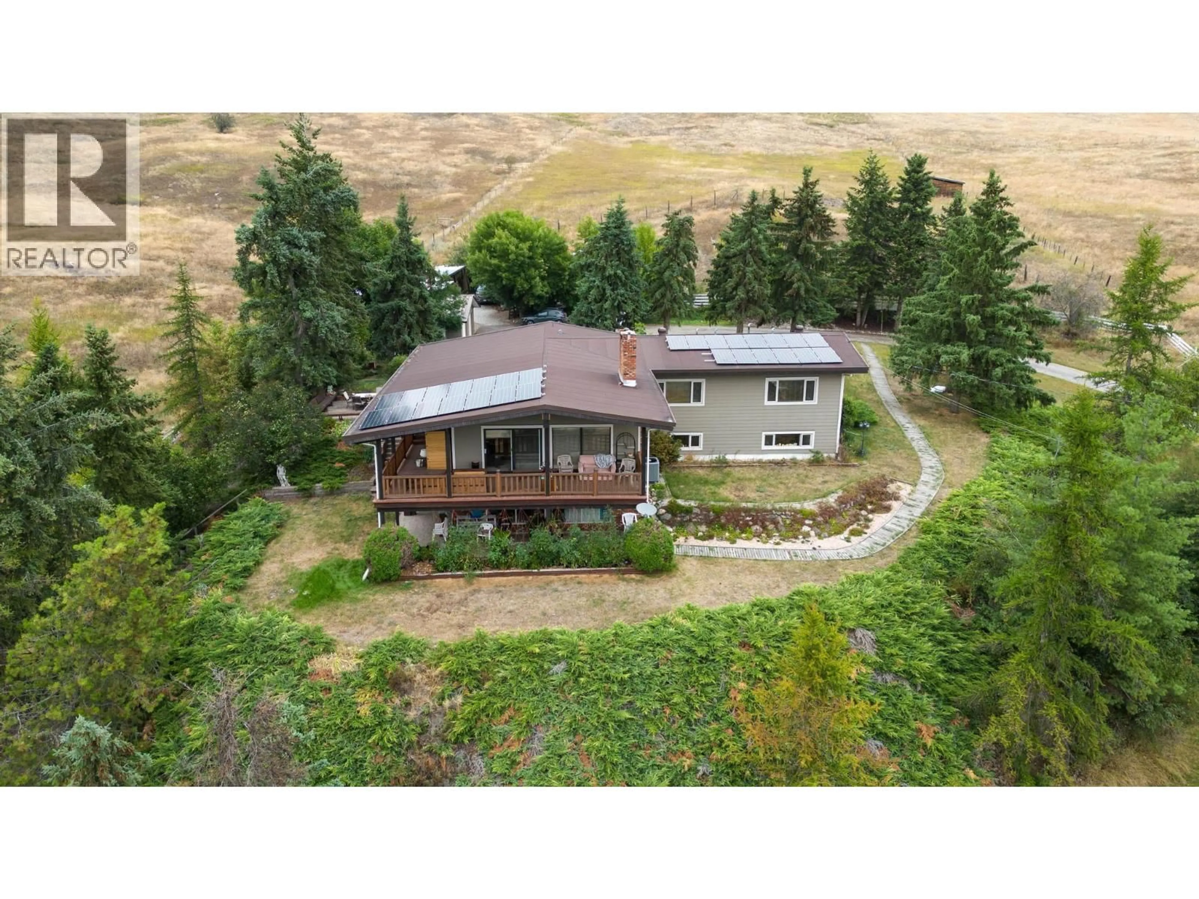 A pic from outside/outdoor area/front of a property/back of a property/a pic from drone, unknown for 2545 6 HIGHWAY, Lumby British Columbia V0E2G1