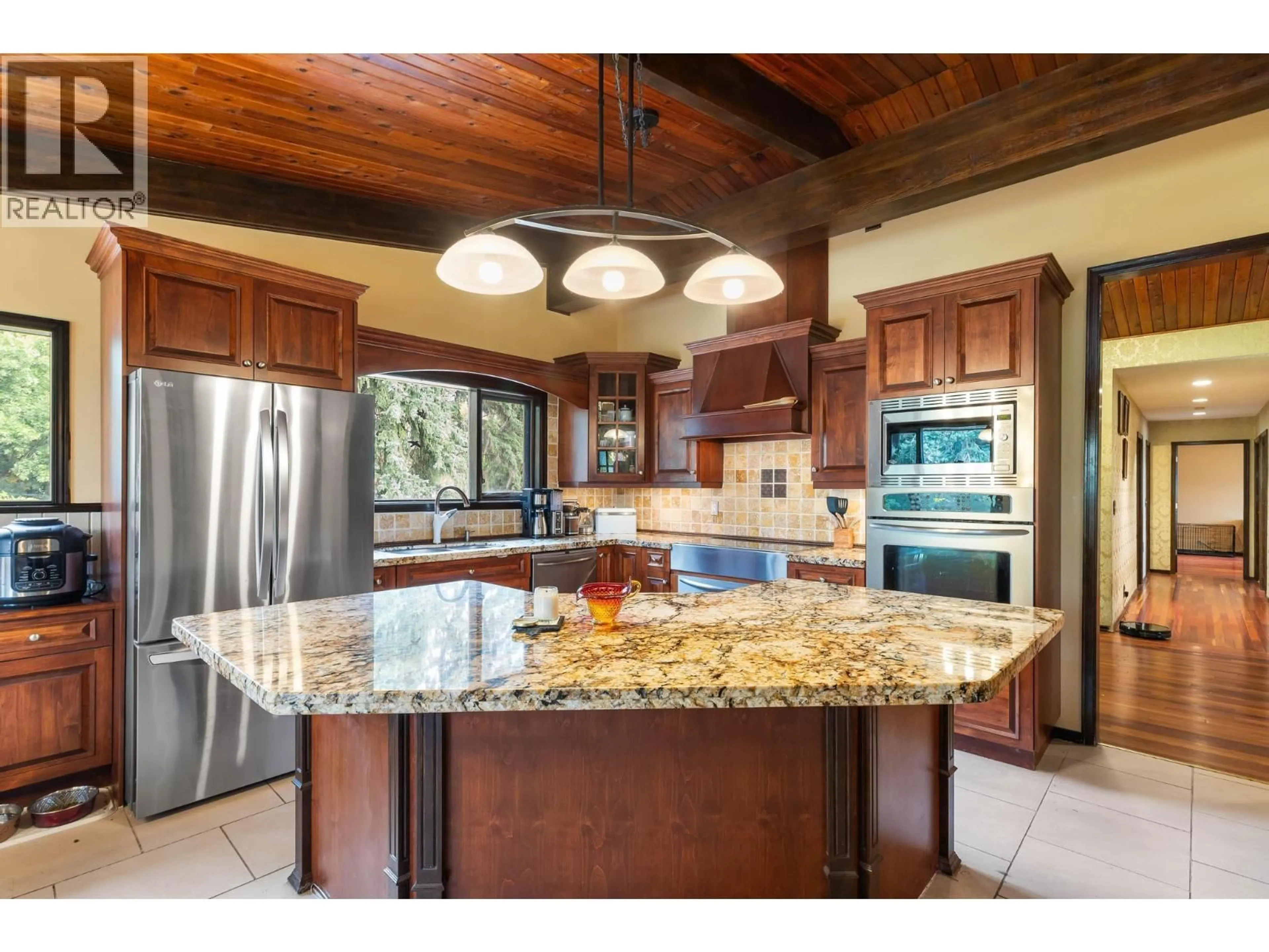 Open concept kitchen, ceramic/tile floor for 2545 6 HIGHWAY, Lumby British Columbia V0E2G1