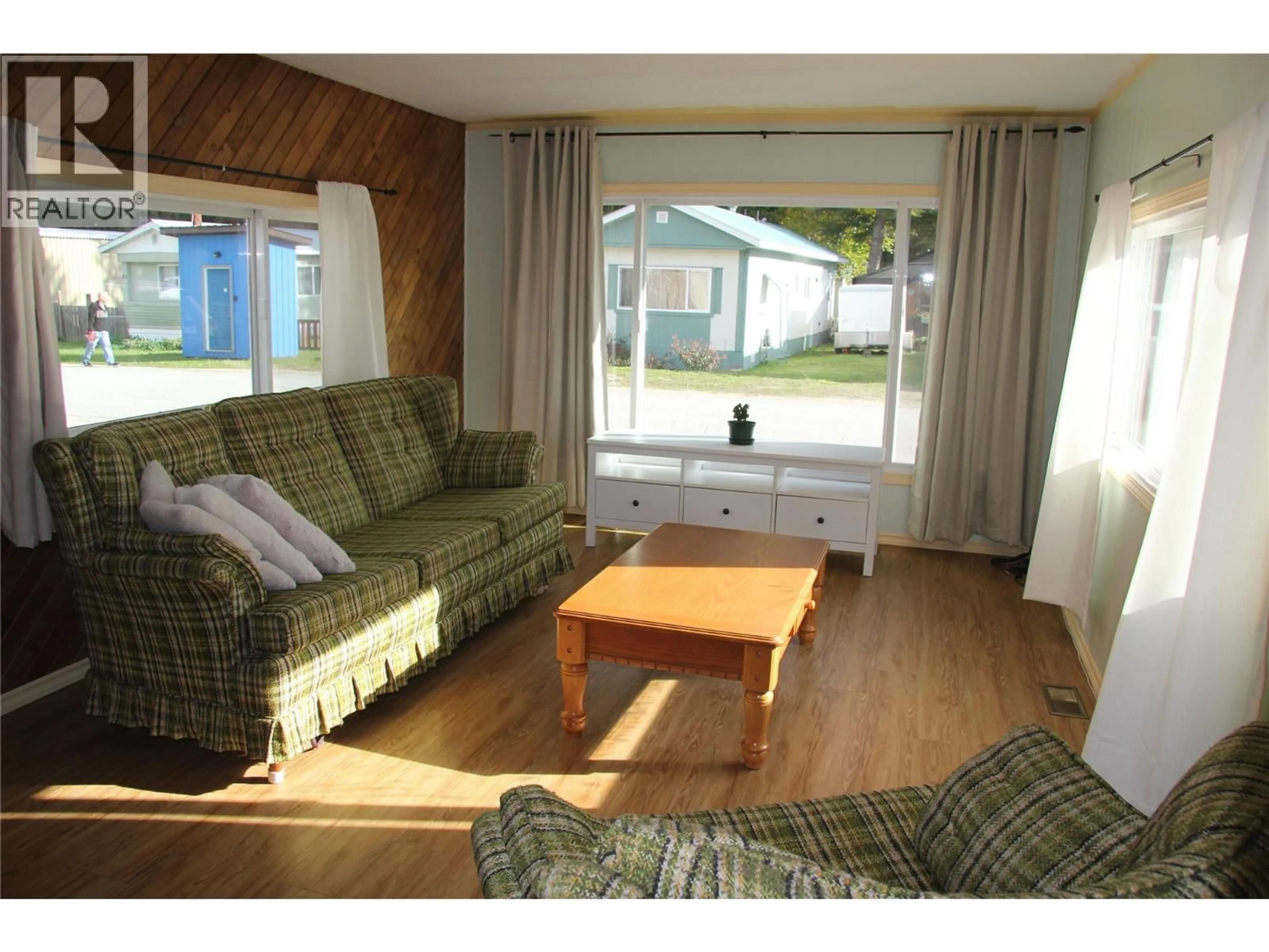 Living room with furniture, wood/laminate floor for 6 - 1204 MAPLEWOOD STREET, Revelstoke British Columbia V0E2S2