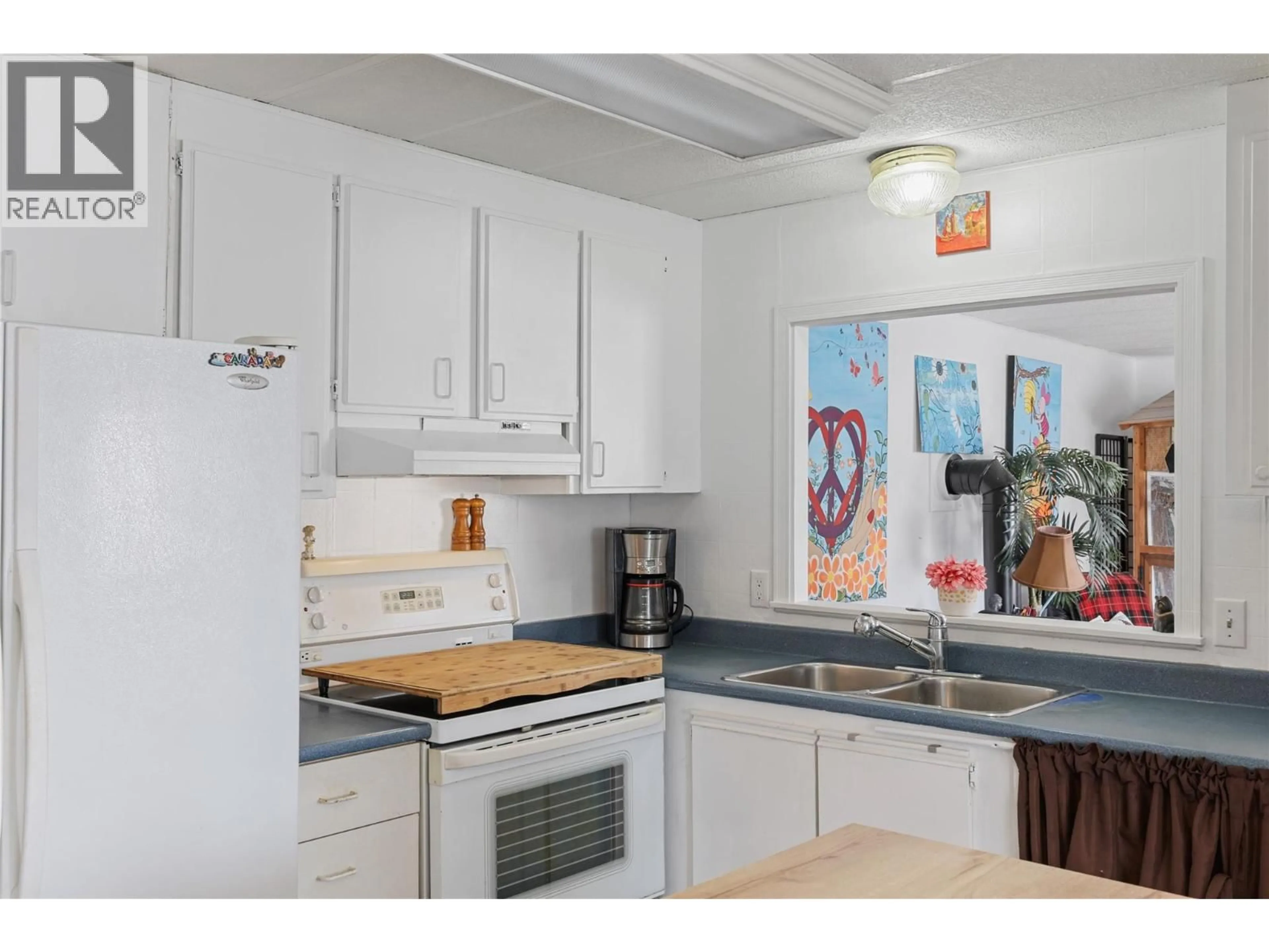 Standard kitchen, ceramic/tile floor for 202 - 2400 OAKDALE WAY, Kamloops British Columbia V2B6W7