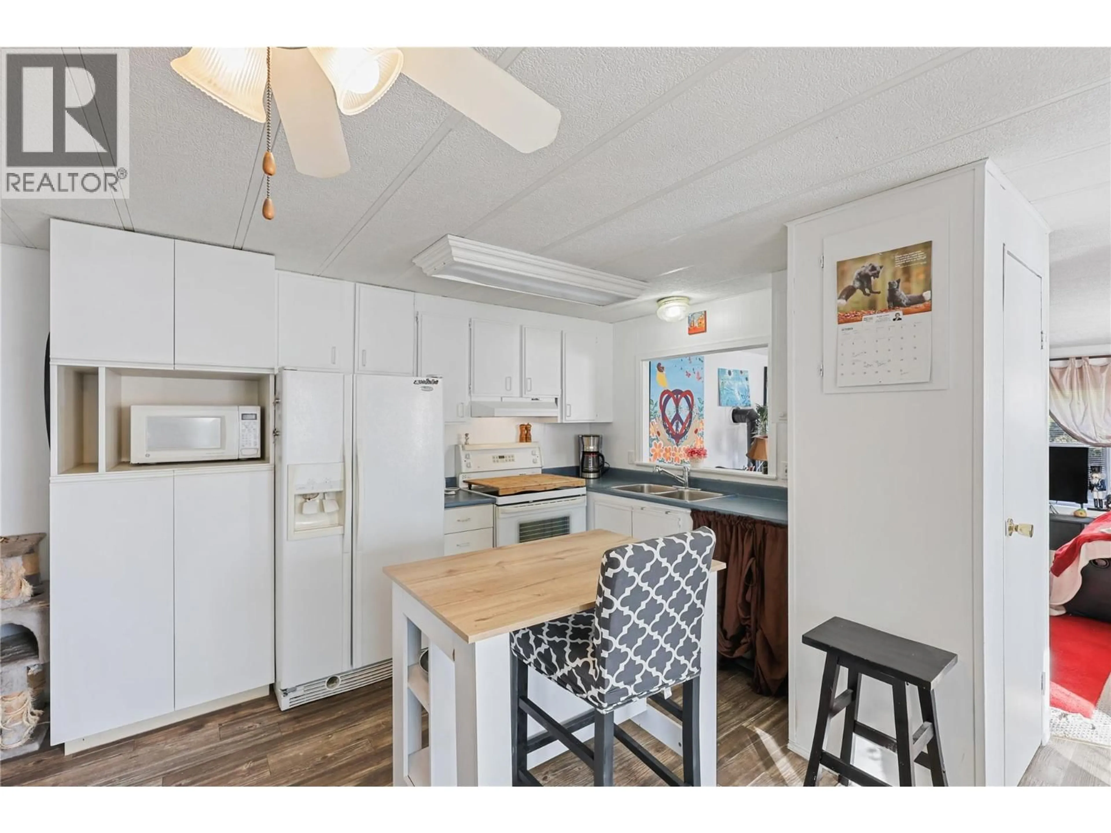 Open concept kitchen, unknown for 202 - 2400 OAKDALE WAY, Kamloops British Columbia V2B6W7