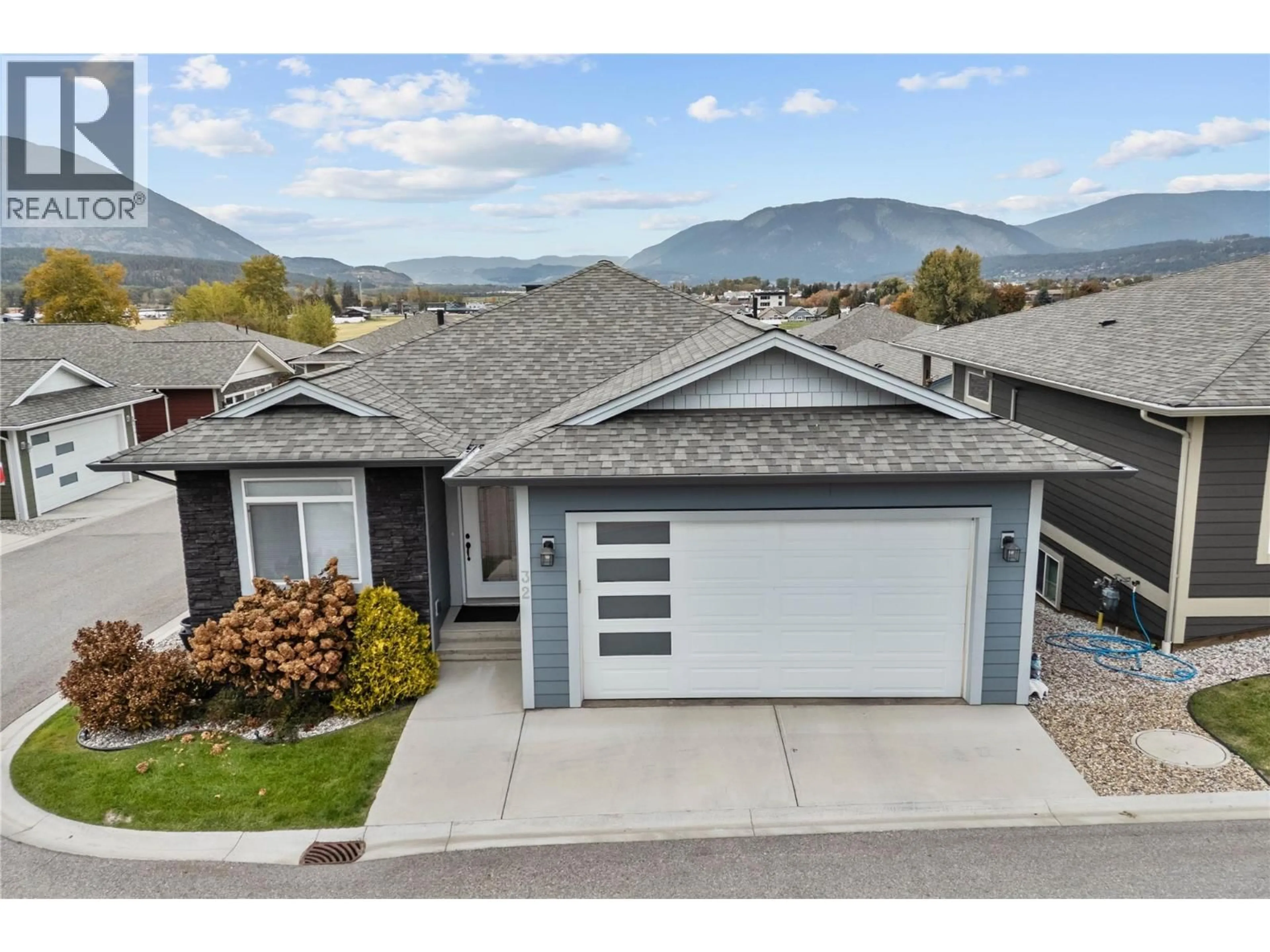 A pic from outside/outdoor area/front of a property/back of a property/a pic from drone, mountain view for 32 - 1791 10 STREET SOUTHWEST, Salmon Arm British Columbia V1E0E9