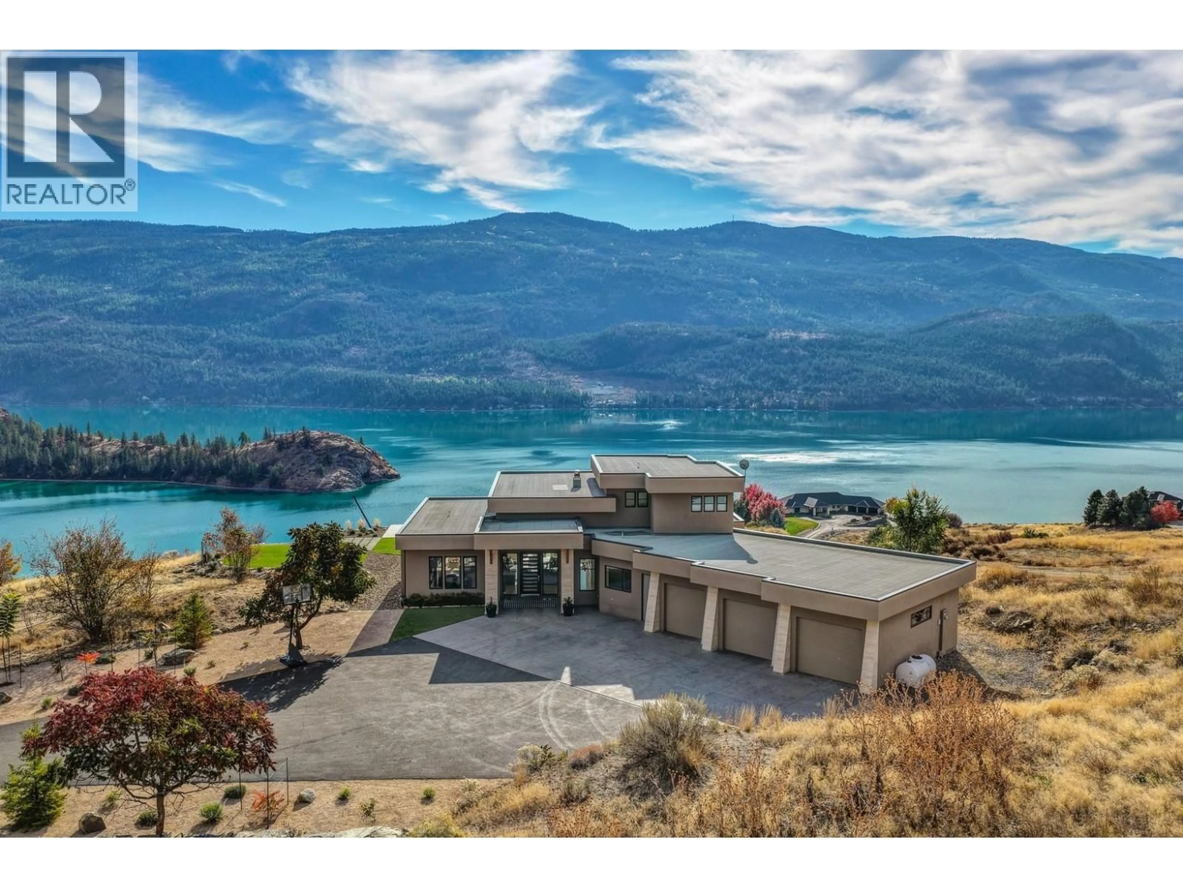 A pic from outside/outdoor area/front of a property/back of a property/a pic from drone, water/lake/river/ocean view for 238 KALAMALKA LAKEVIEW DRIVE, Vernon British Columbia V1H1G1