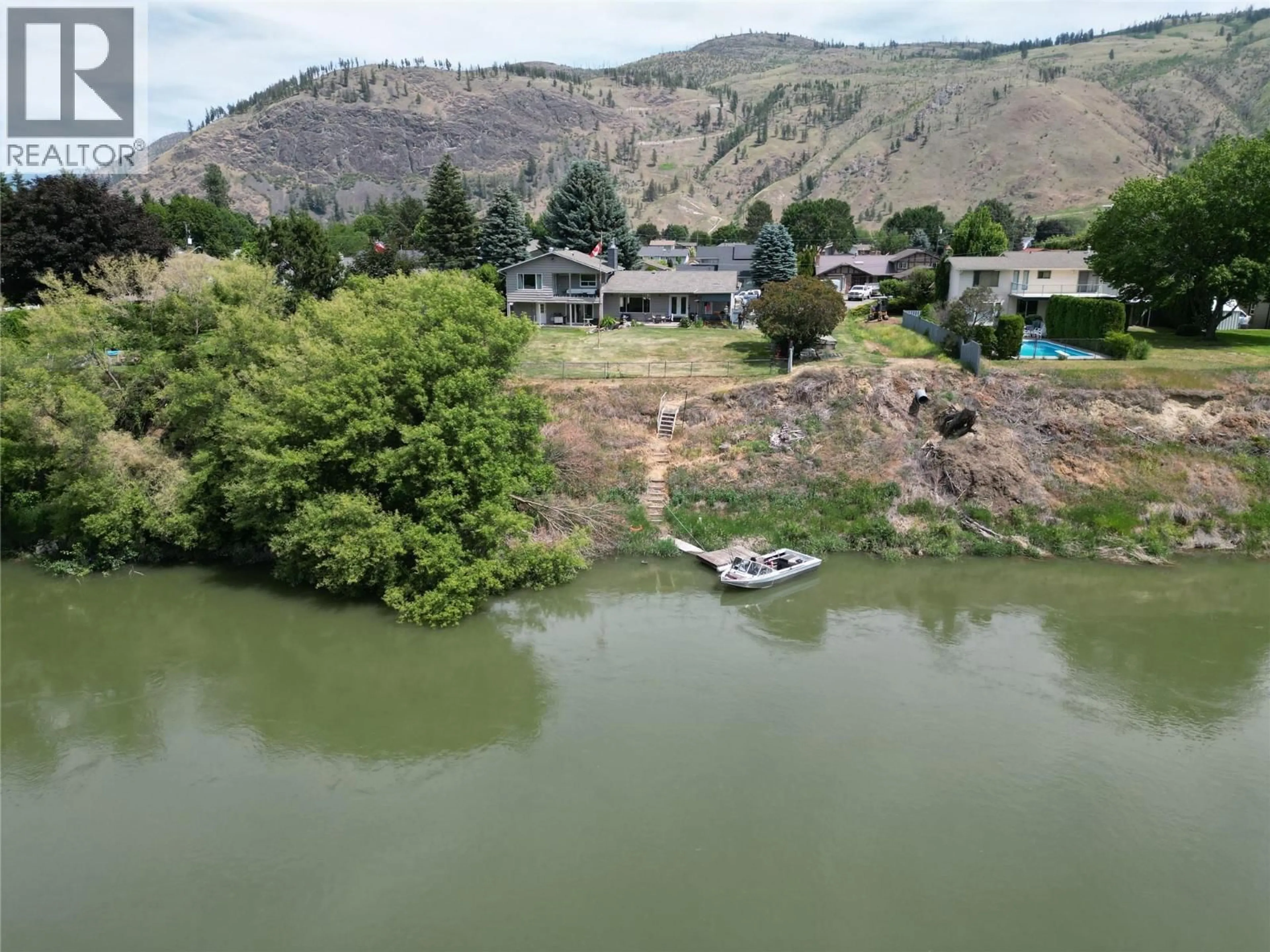 A pic from outside/outdoor area/front of a property/back of a property/a pic from drone, water/lake/river/ocean view for 4355 FURIAK ROAD, Kamloops British Columbia V2H1L3