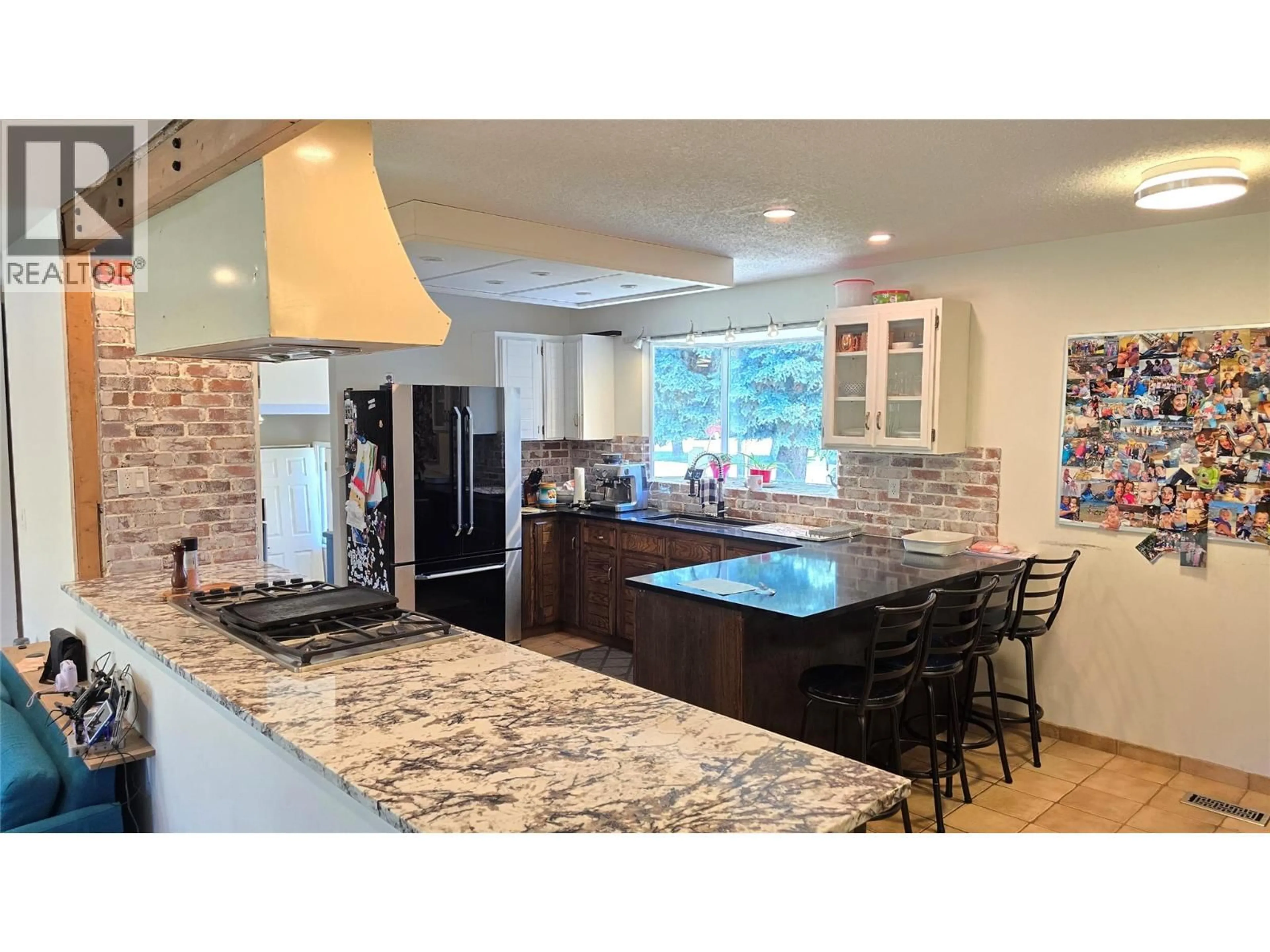 Open concept kitchen, ceramic/tile floor for 4355 FURIAK ROAD, Kamloops British Columbia V2H1L3