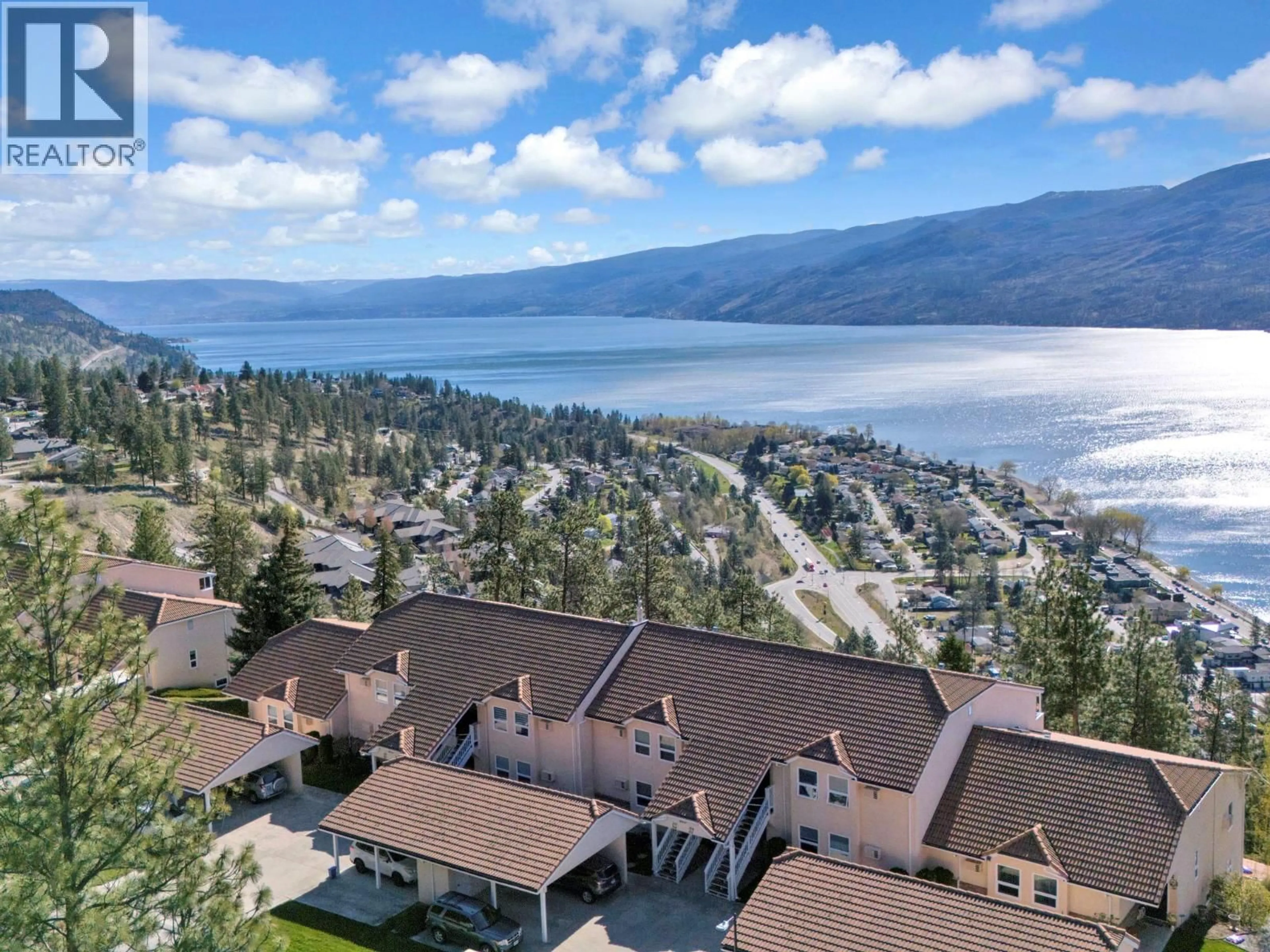 A pic from outside/outdoor area/front of a property/back of a property/a pic from drone, water/lake/river/ocean view for 204 - 4450 PONDEROSA DRIVE, Peachland British Columbia V0H1X5
