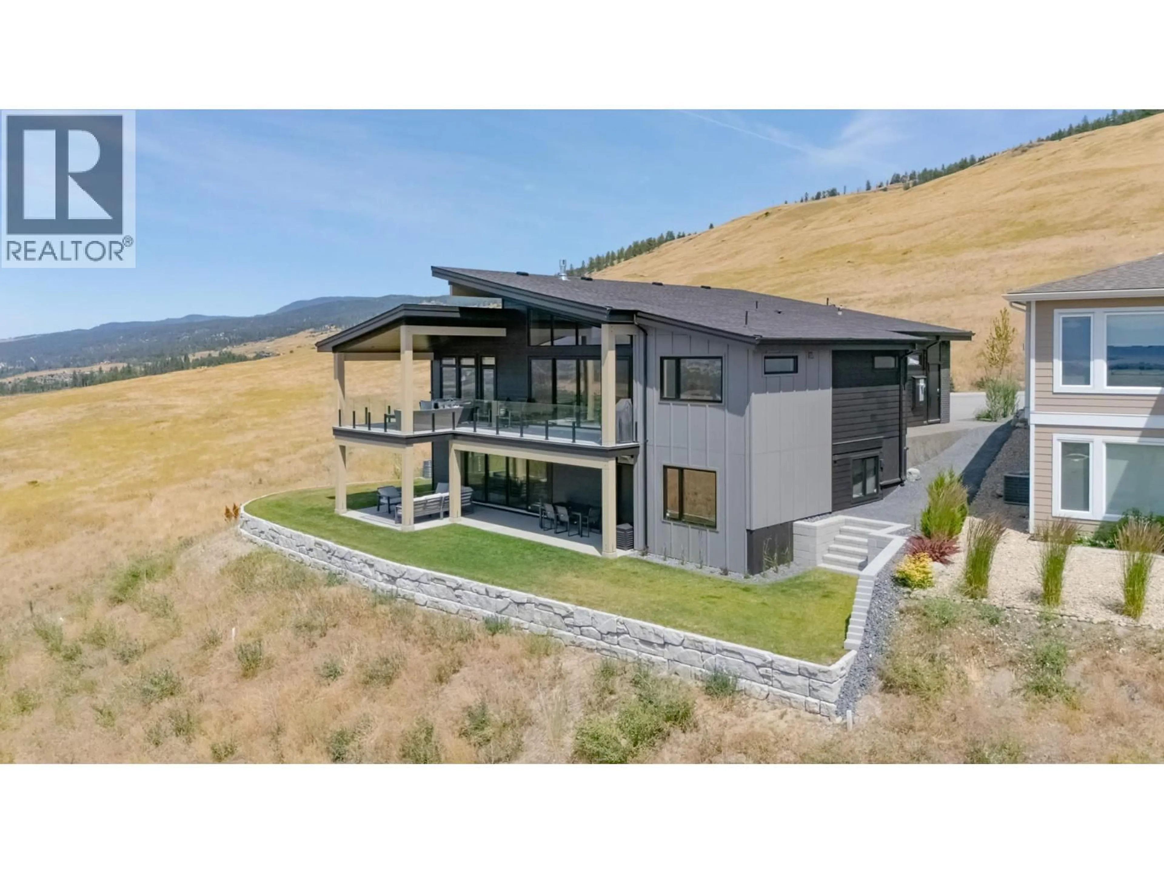 A pic from outside/outdoor area/front of a property/back of a property/a pic from drone, mountain view for 2192 RYEGRASS ROAD, Kelowna British Columbia V1P0A2
