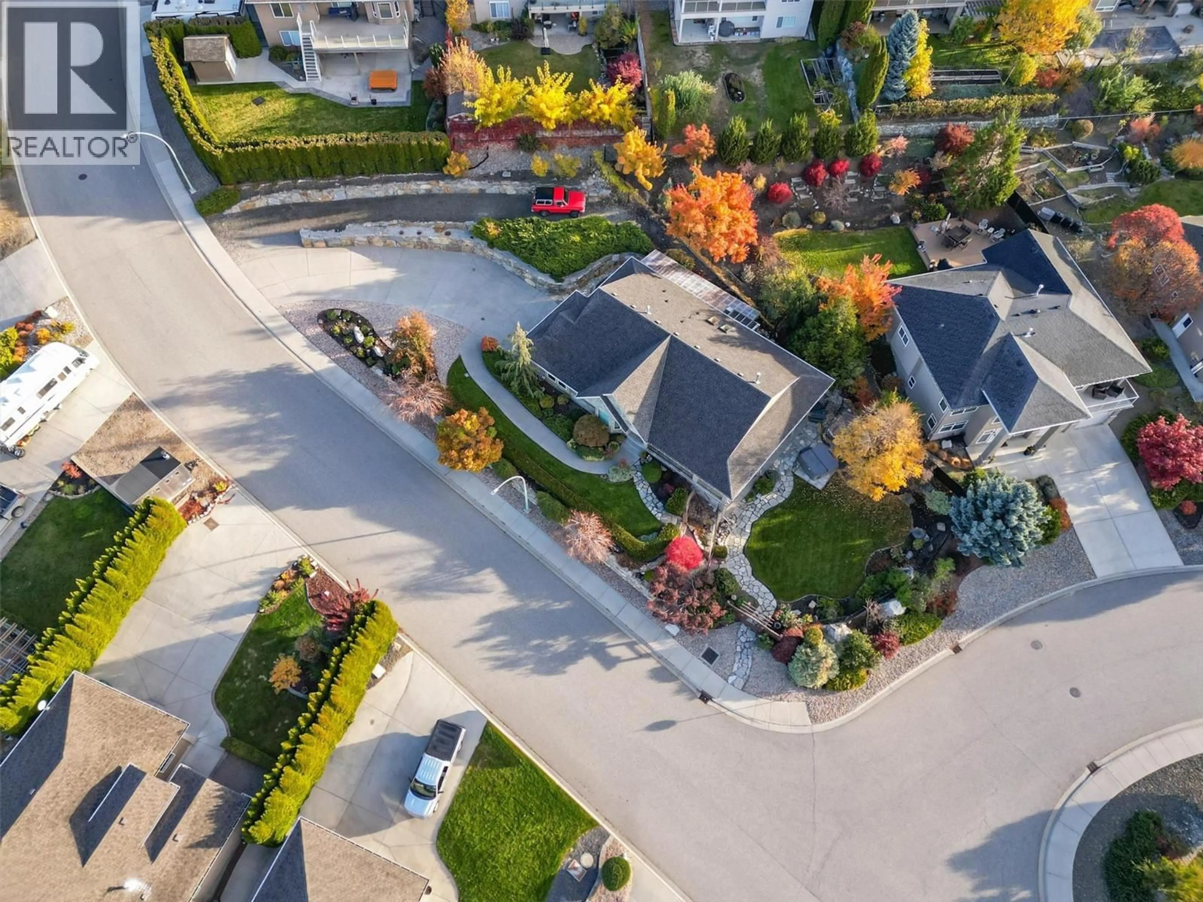 A pic from outside/outdoor area/front of a property/back of a property/a pic from drone, street for 3275 MERLOT COURT, West Kelowna British Columbia V4T2W7
