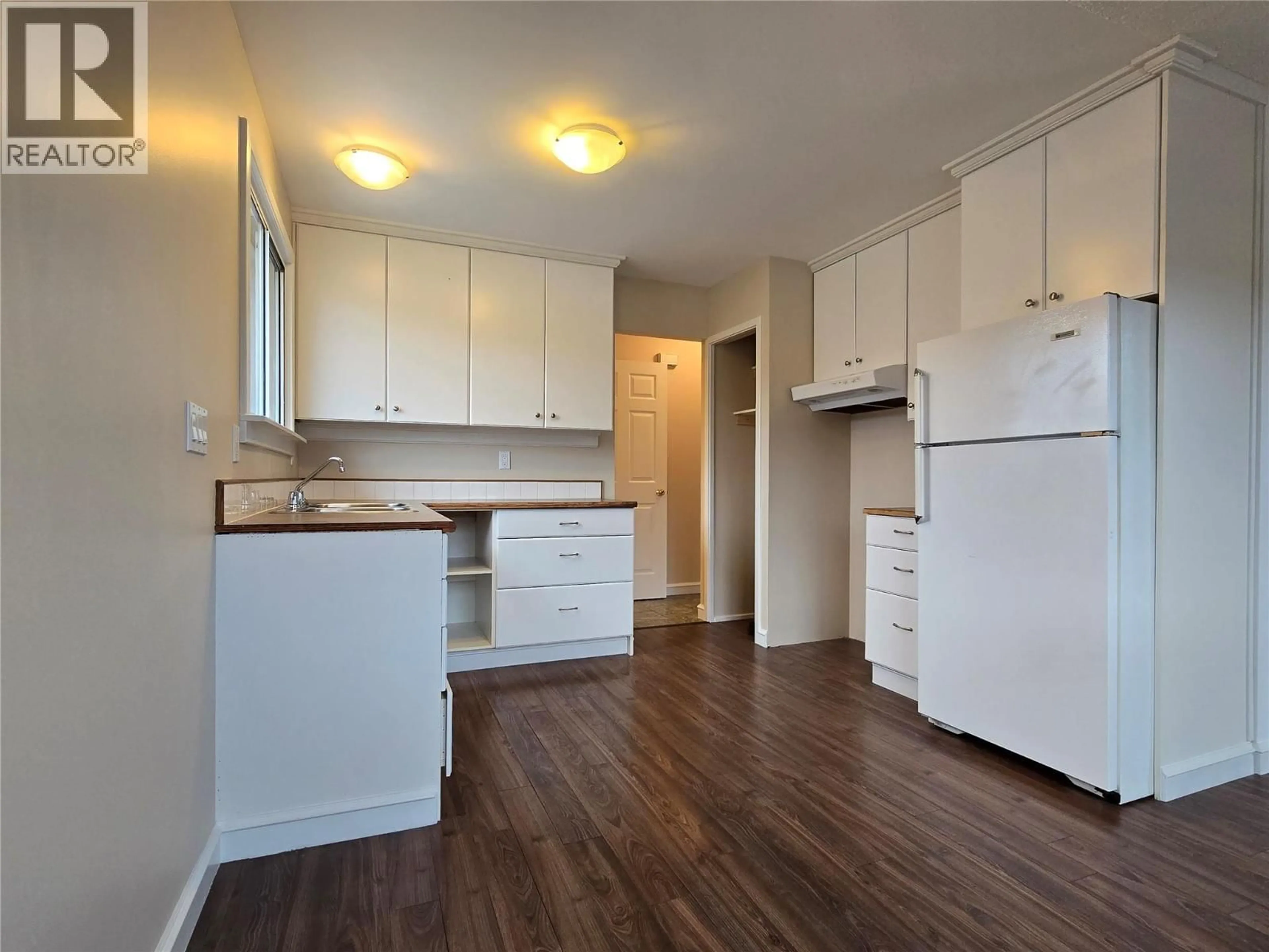 Standard kitchen, wood/laminate floor for 1584 STAGE ROAD, Cache Creek British Columbia V0K1H0