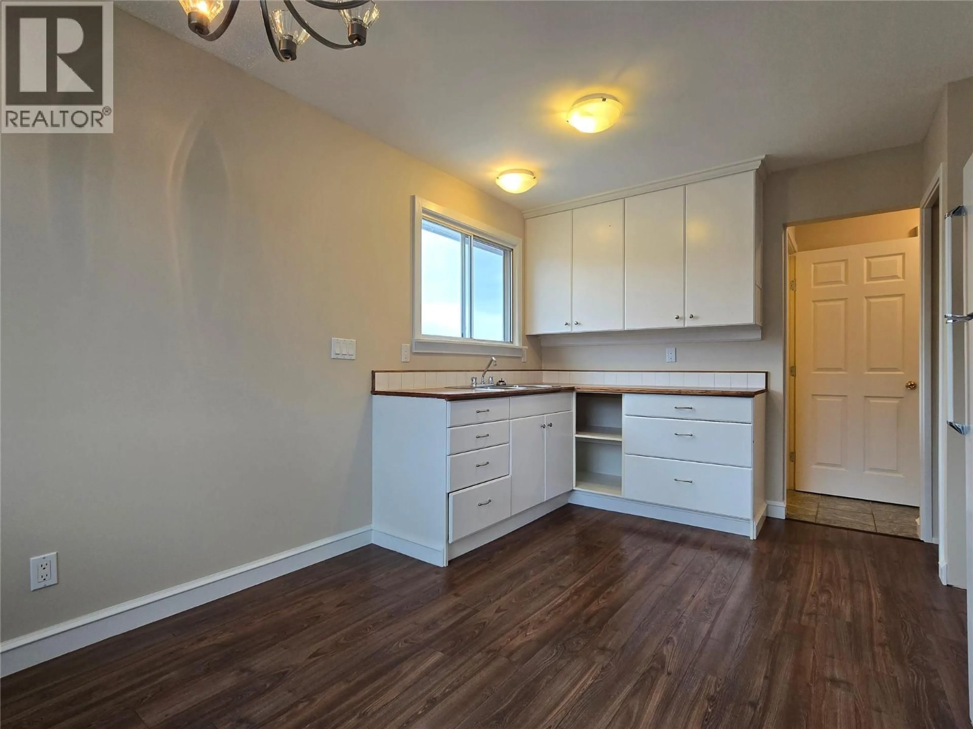 Open concept kitchen, wood/laminate floor for 1584 STAGE ROAD, Cache Creek British Columbia V0K1H0