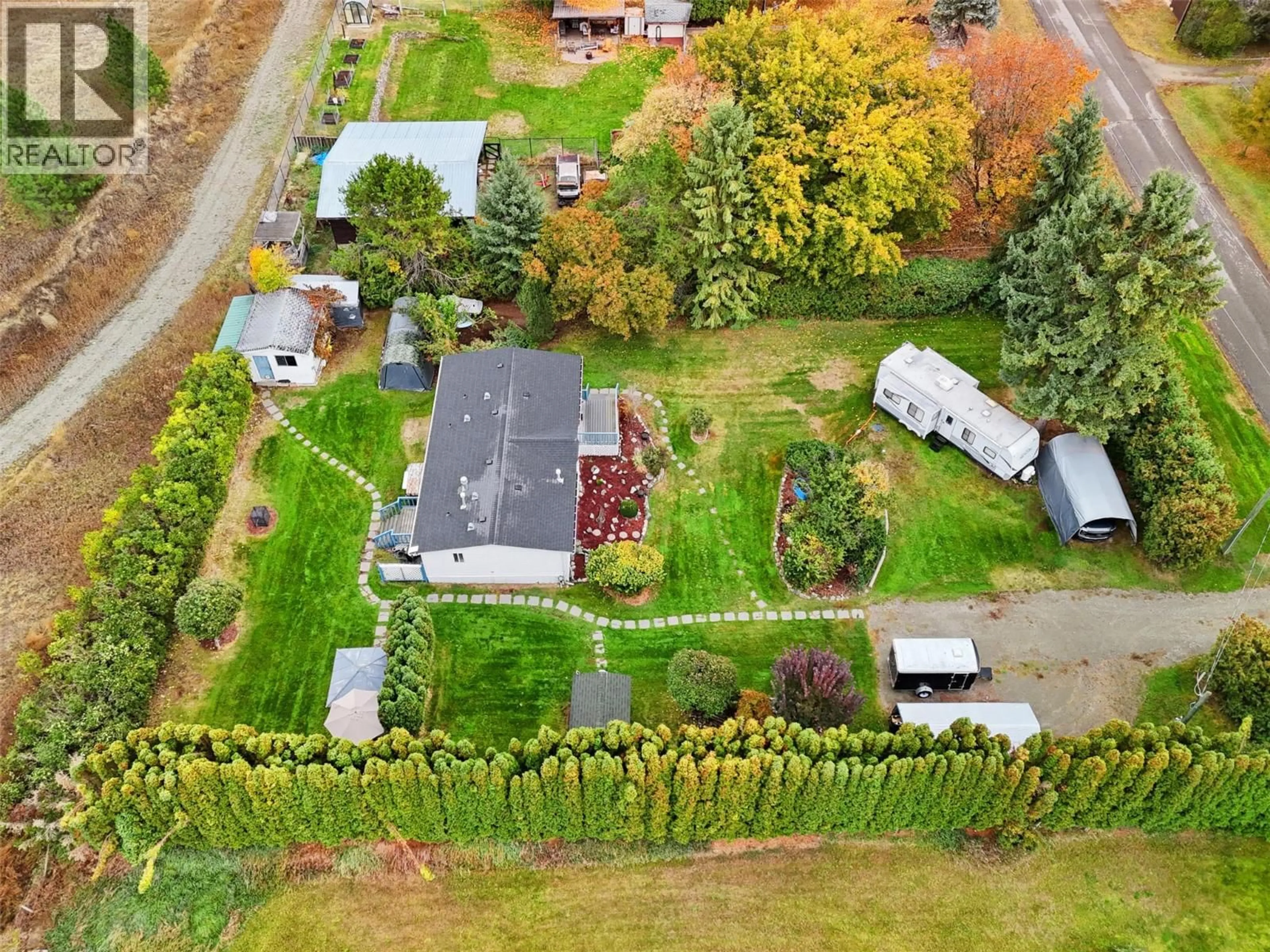 A pic from outside/outdoor area/front of a property/back of a property/a pic from drone, street for 120 ZIRNHELT ROAD, Kamloops British Columbia V2H0B3