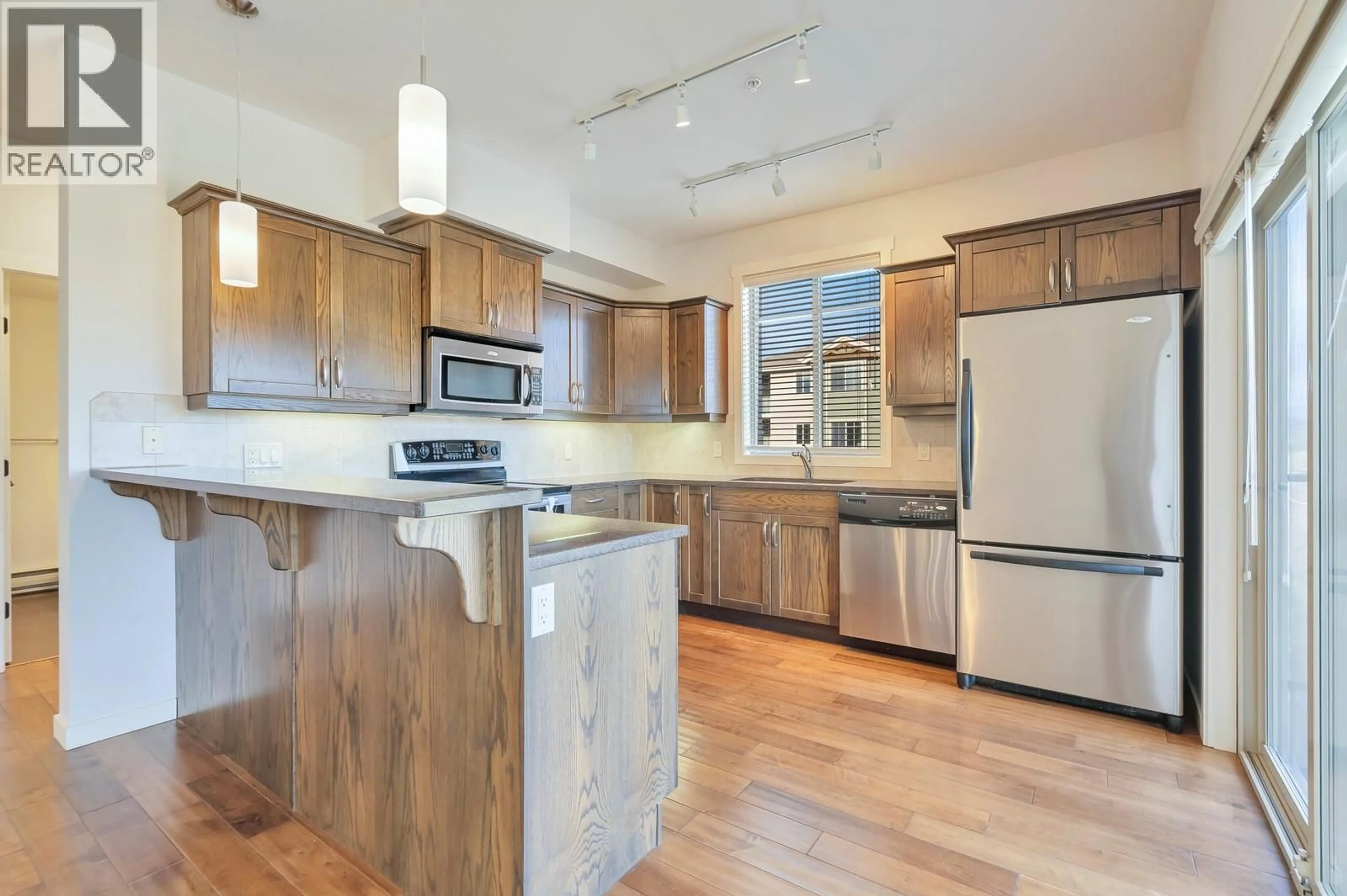 Open concept kitchen, unknown for 313 - 3739 CASORSO ROAD, Kelowna British Columbia V1W5E8