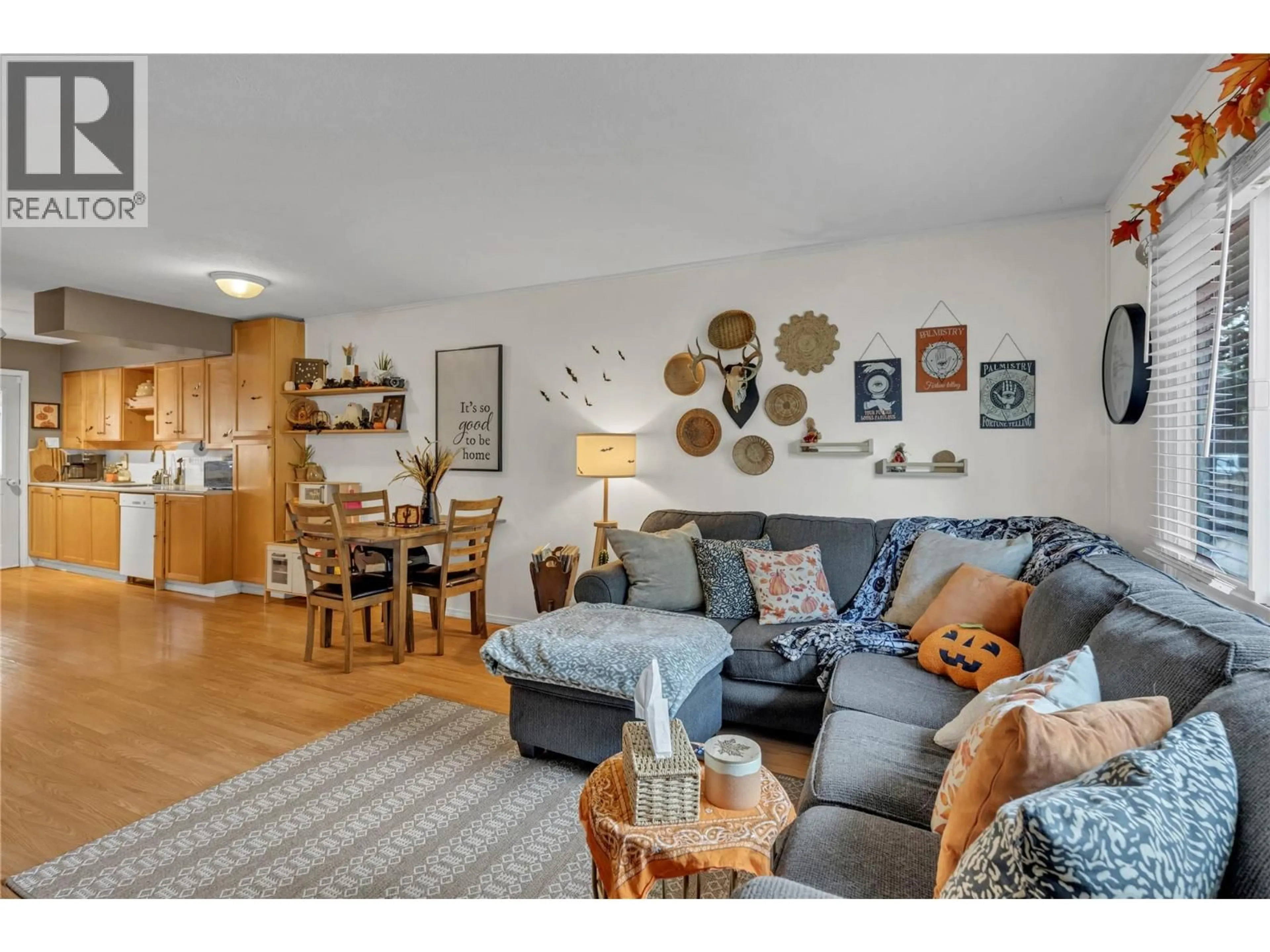Living room with furniture, wood/laminate floor for 203 MOODY STREET, Princeton British Columbia V0X1W0