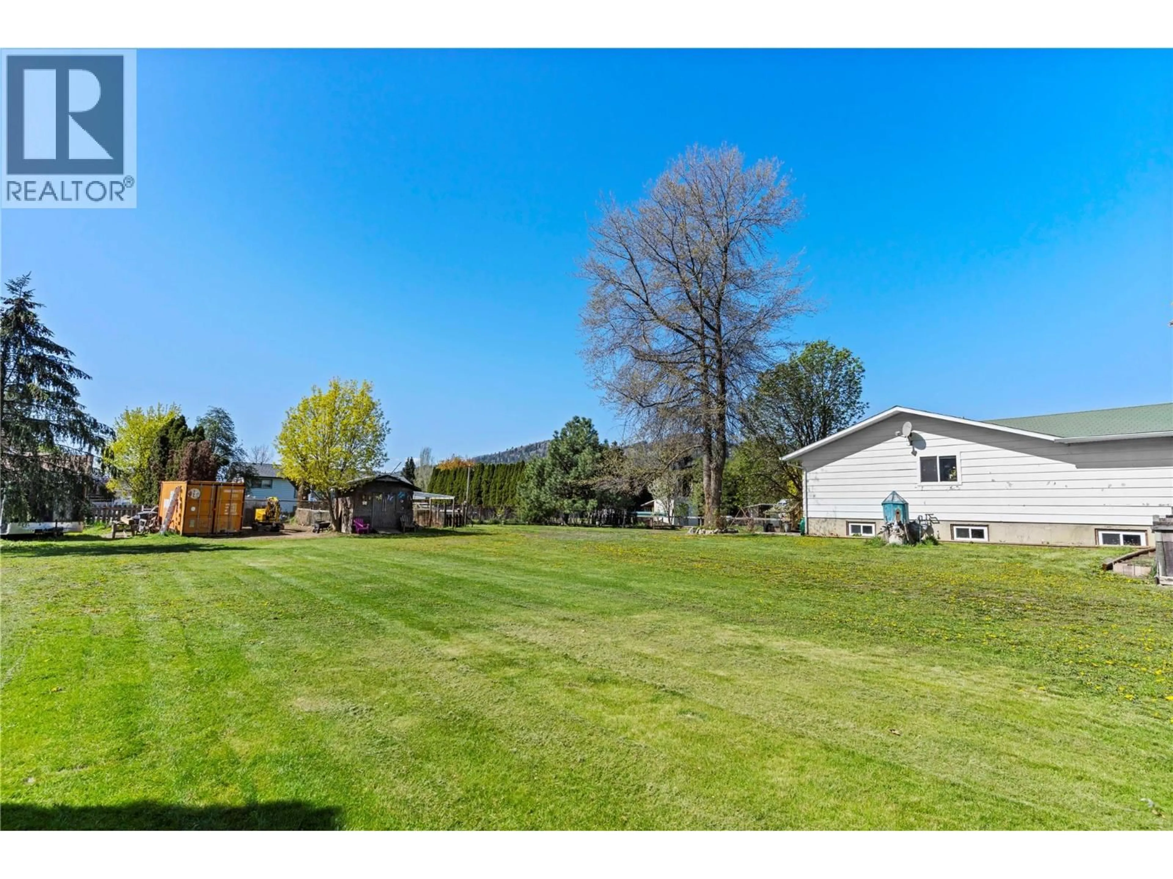 A pic from outside/outdoor area/front of a property/back of a property/a pic from drone, water/lake/river/ocean view for 353 REIGHMOUNT DRIVE, Kamloops British Columbia V2H1M2