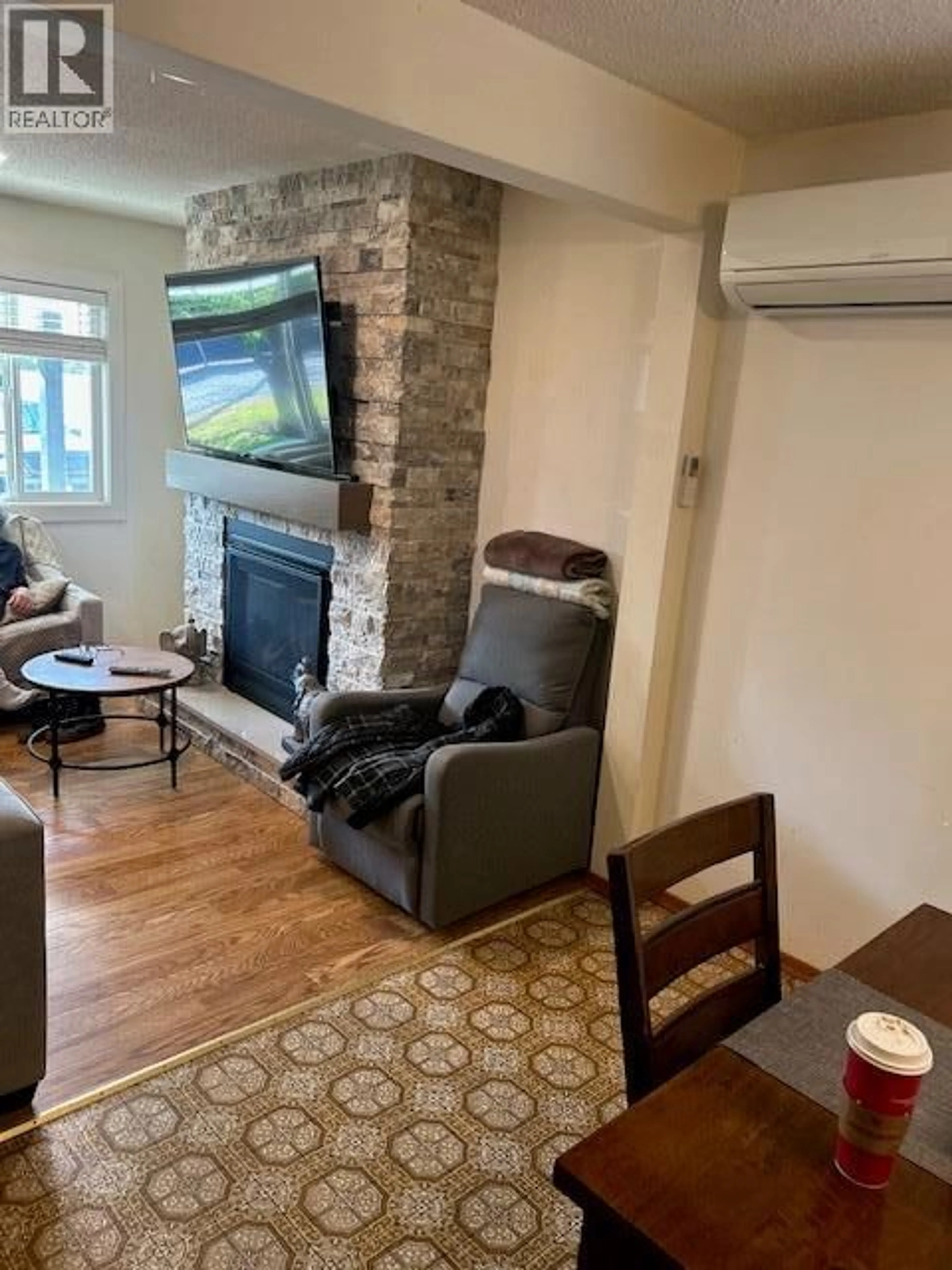Living room with furniture, unknown for 3537 LAKESHORE ROAD, Kelowna British Columbia V1W3K1