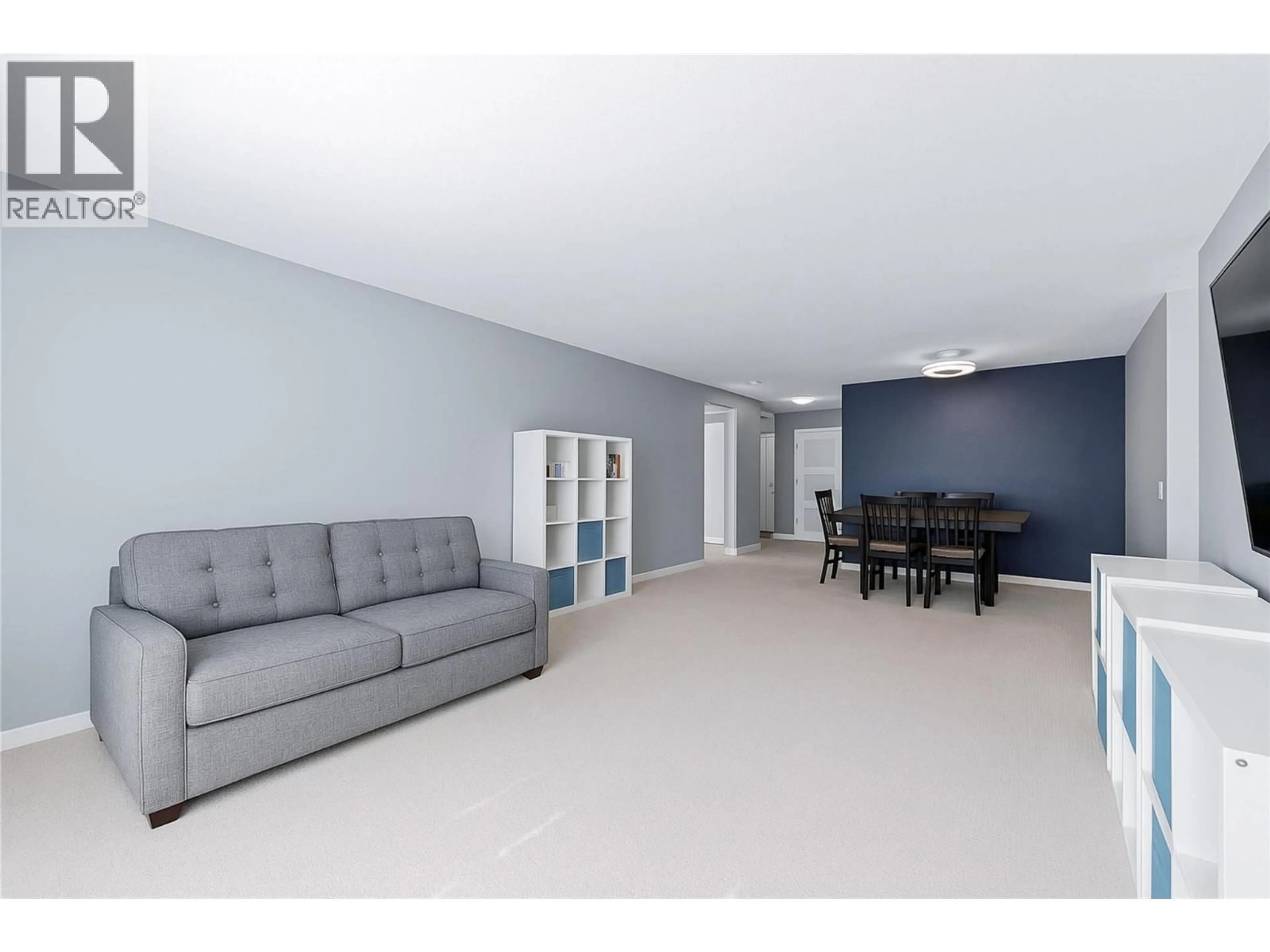 Living room with furniture, unknown for 301 - 555 YATES ROAD, Kelowna British Columbia V1V2V2