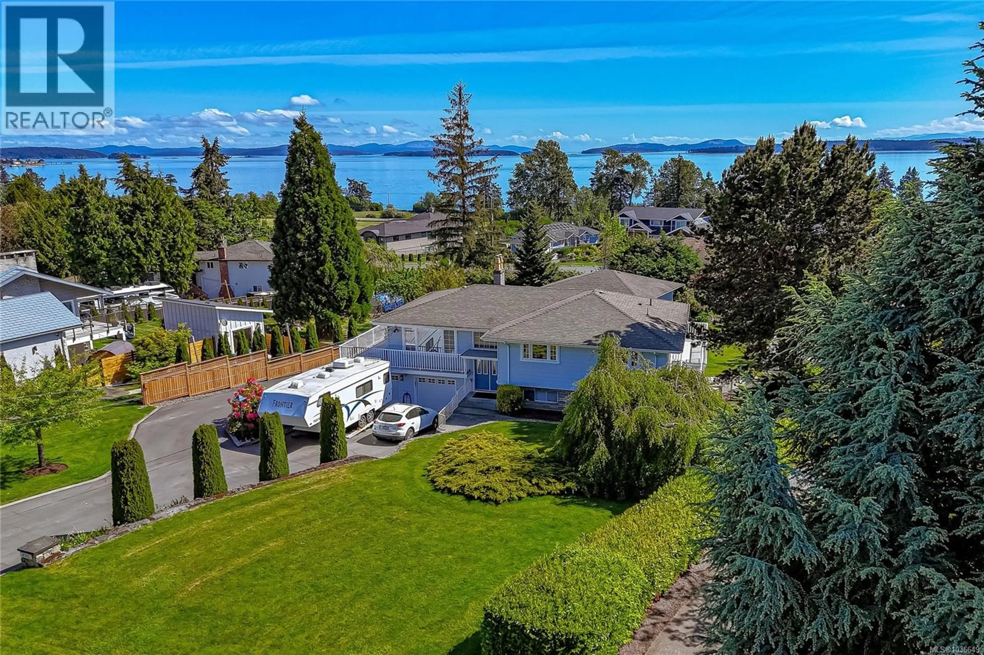 A pic from outside/outdoor area/front of a property/back of a property/a pic from drone, water/lake/river/ocean view for 8705 EBOR TERRACE, North Saanich British Columbia V8L1L7