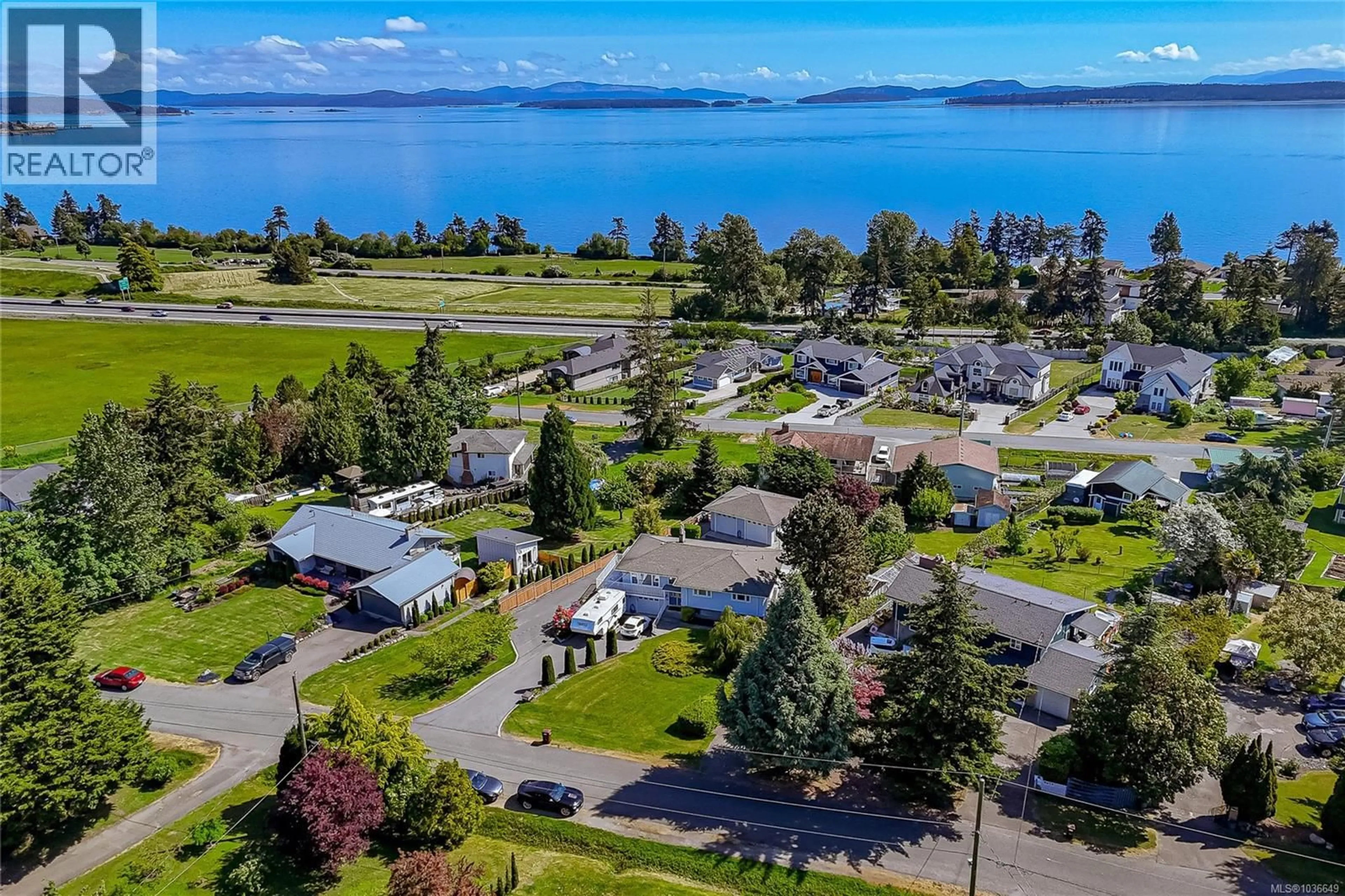 A pic from outside/outdoor area/front of a property/back of a property/a pic from drone, water/lake/river/ocean view for 8705 EBOR TERRACE, North Saanich British Columbia V8L1L7
