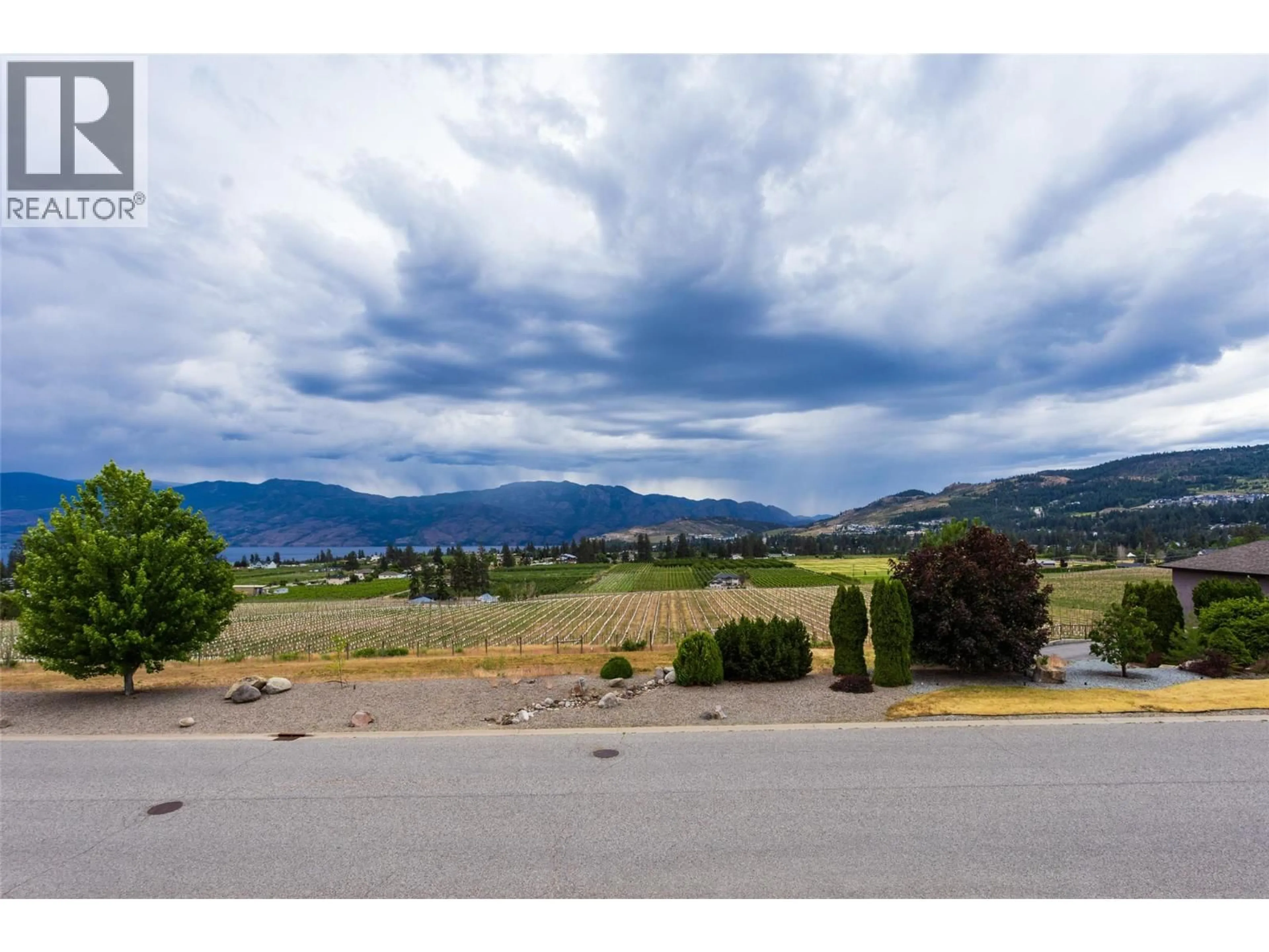 A pic from outside/outdoor area/front of a property/back of a property/a pic from drone, mountain view for 2838 SALISH ROAD, West Kelowna British Columbia V4T2V9
