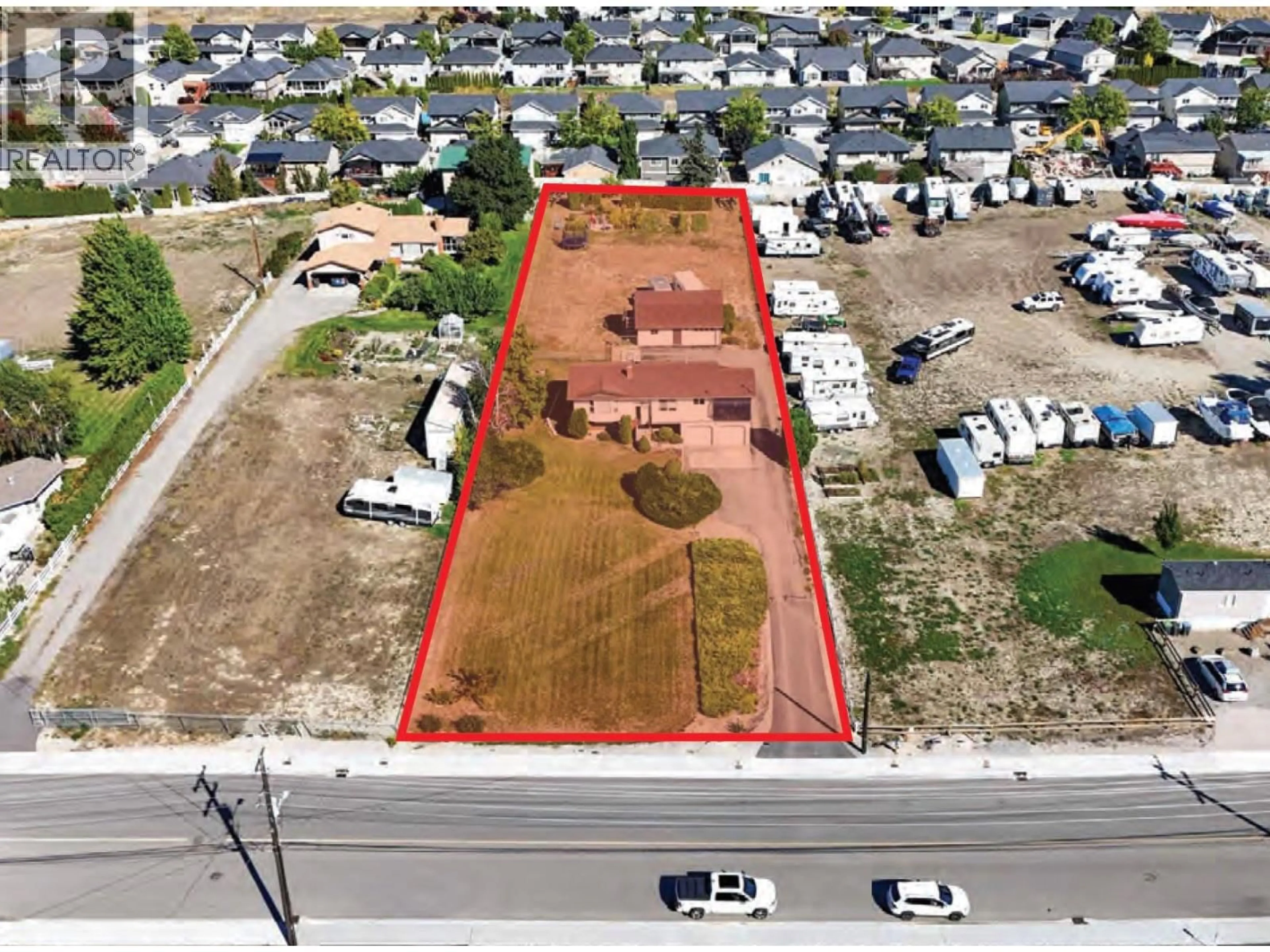 A pic from outside/outdoor area/front of a property/back of a property/a pic from drone, street for 3116 APPALOOSA ROAD, Kelowna British Columbia V1V2G9