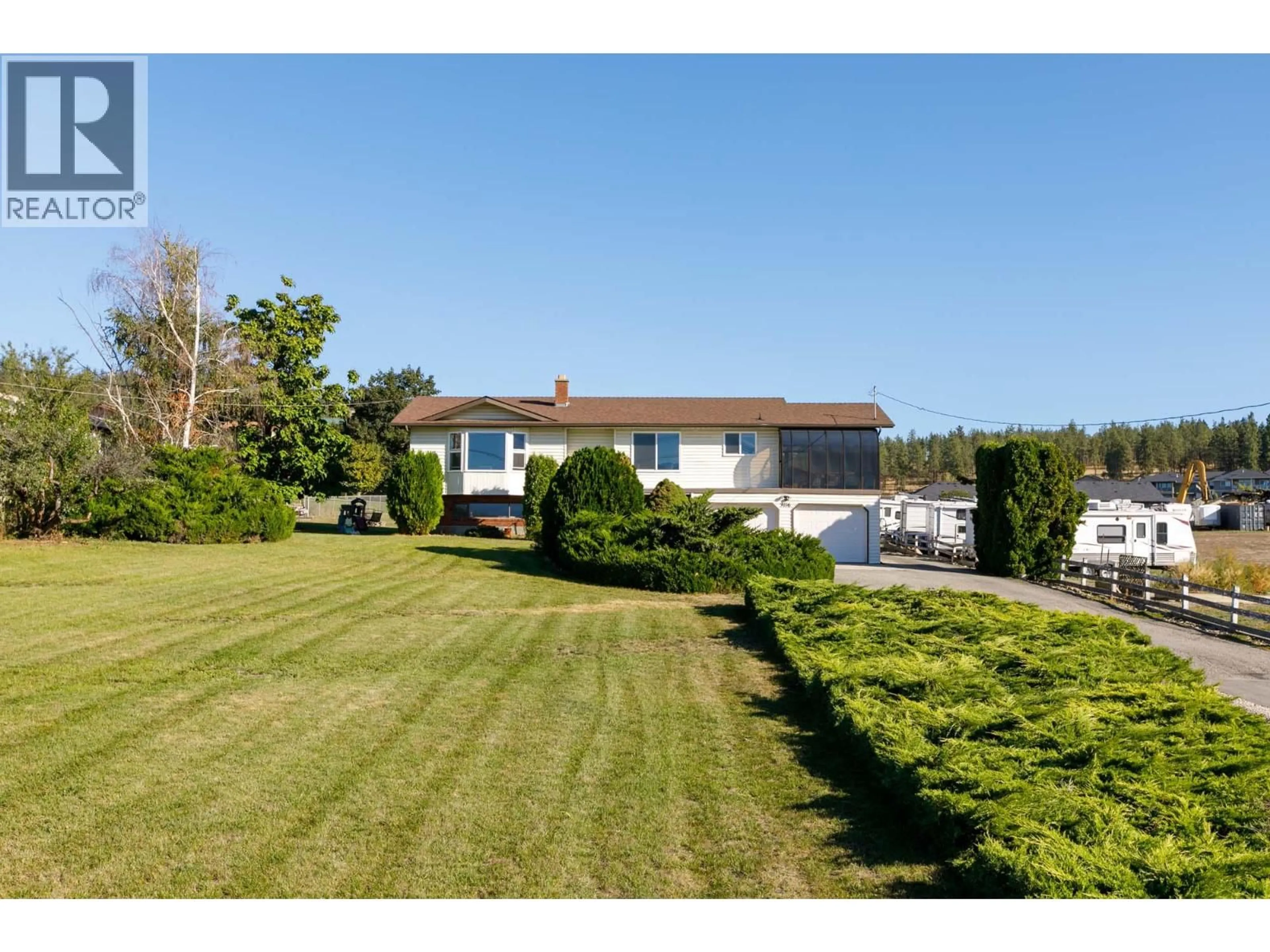 A pic from outside/outdoor area/front of a property/back of a property/a pic from drone, unknown for 3116 APPALOOSA ROAD, Kelowna British Columbia V1V2G9