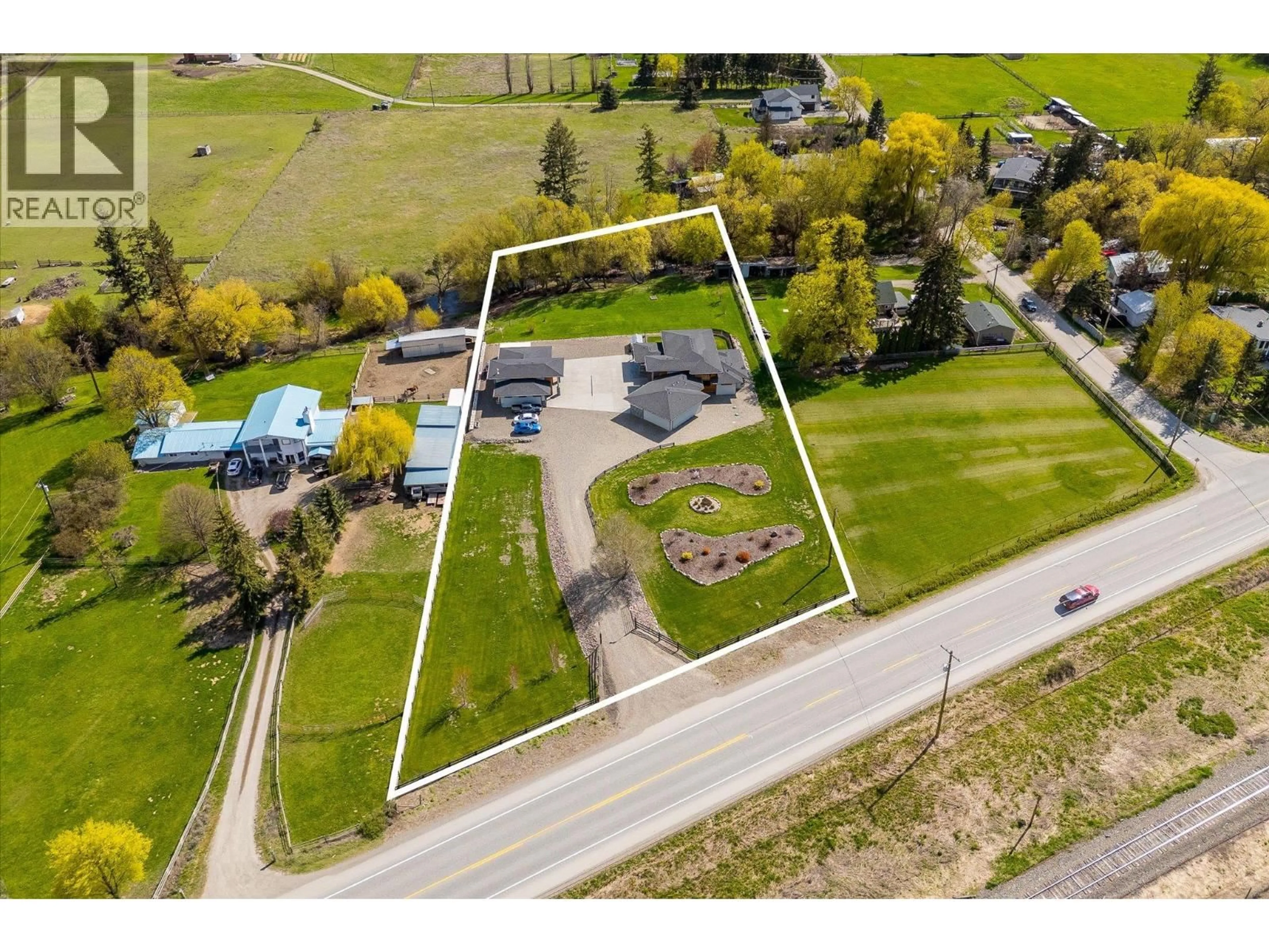 A pic from outside/outdoor area/front of a property/back of a property/a pic from drone, street for 7260 HIGHWAY 6 OTHER, Coldstream British Columbia V1B3H4