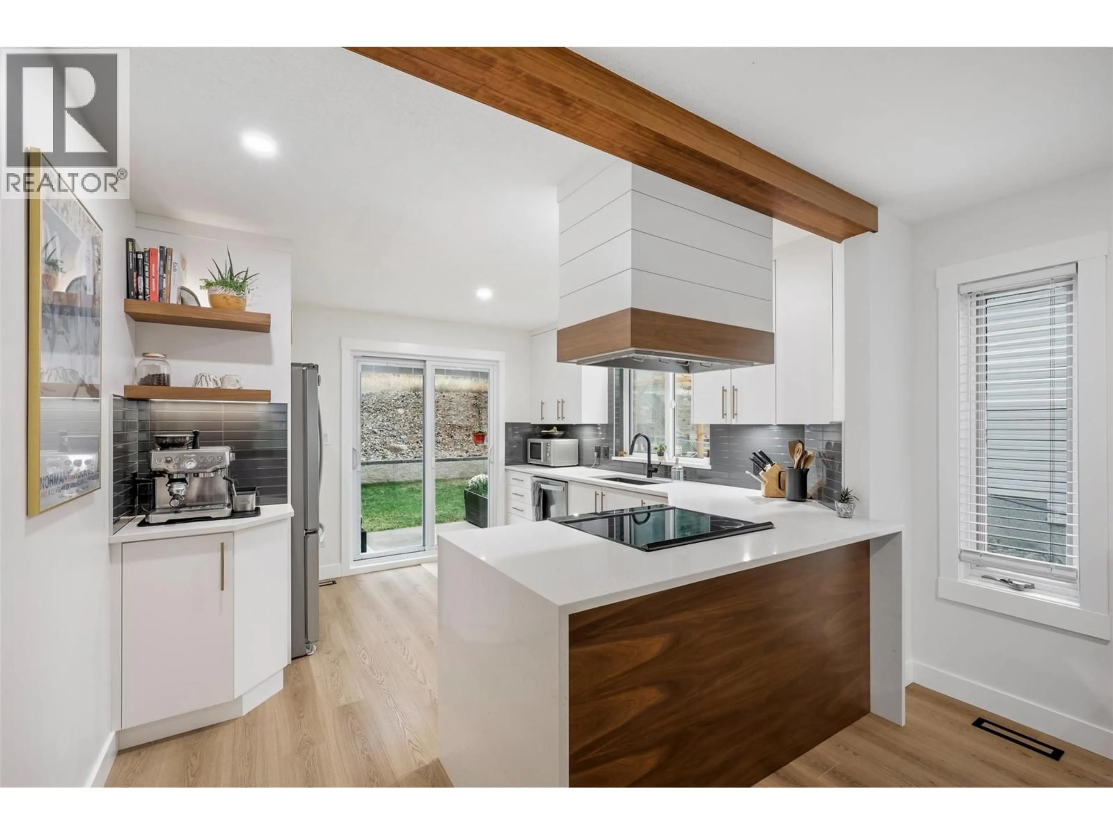 Open concept kitchen, wood/laminate floor for 2753 QU'APPELLE BOULEVARD, Kamloops British Columbia V2E2J9