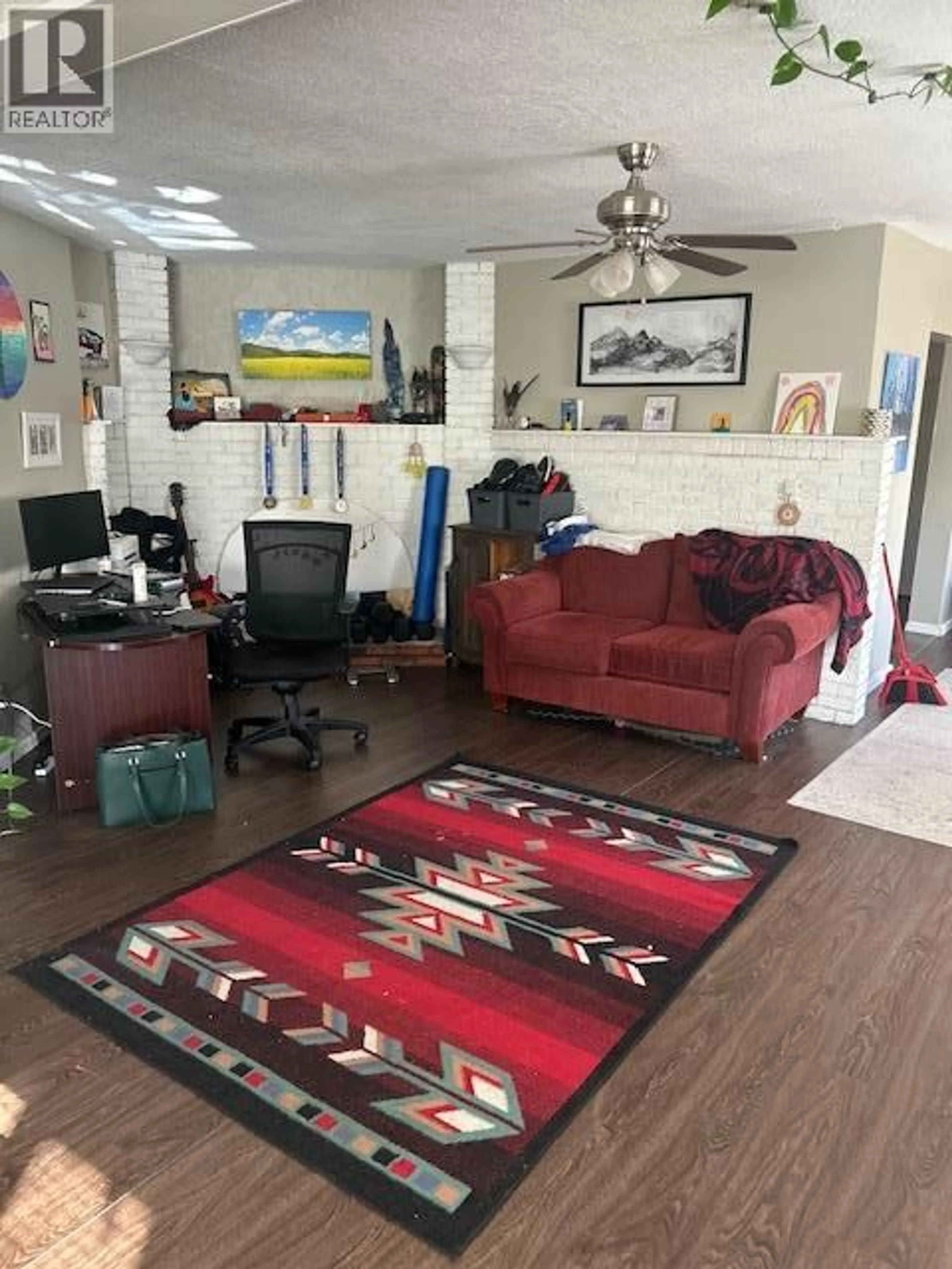 Living room with furniture, unknown for 3531 LAKESHORE ROAD, Kelowna British Columbia V1W3K1