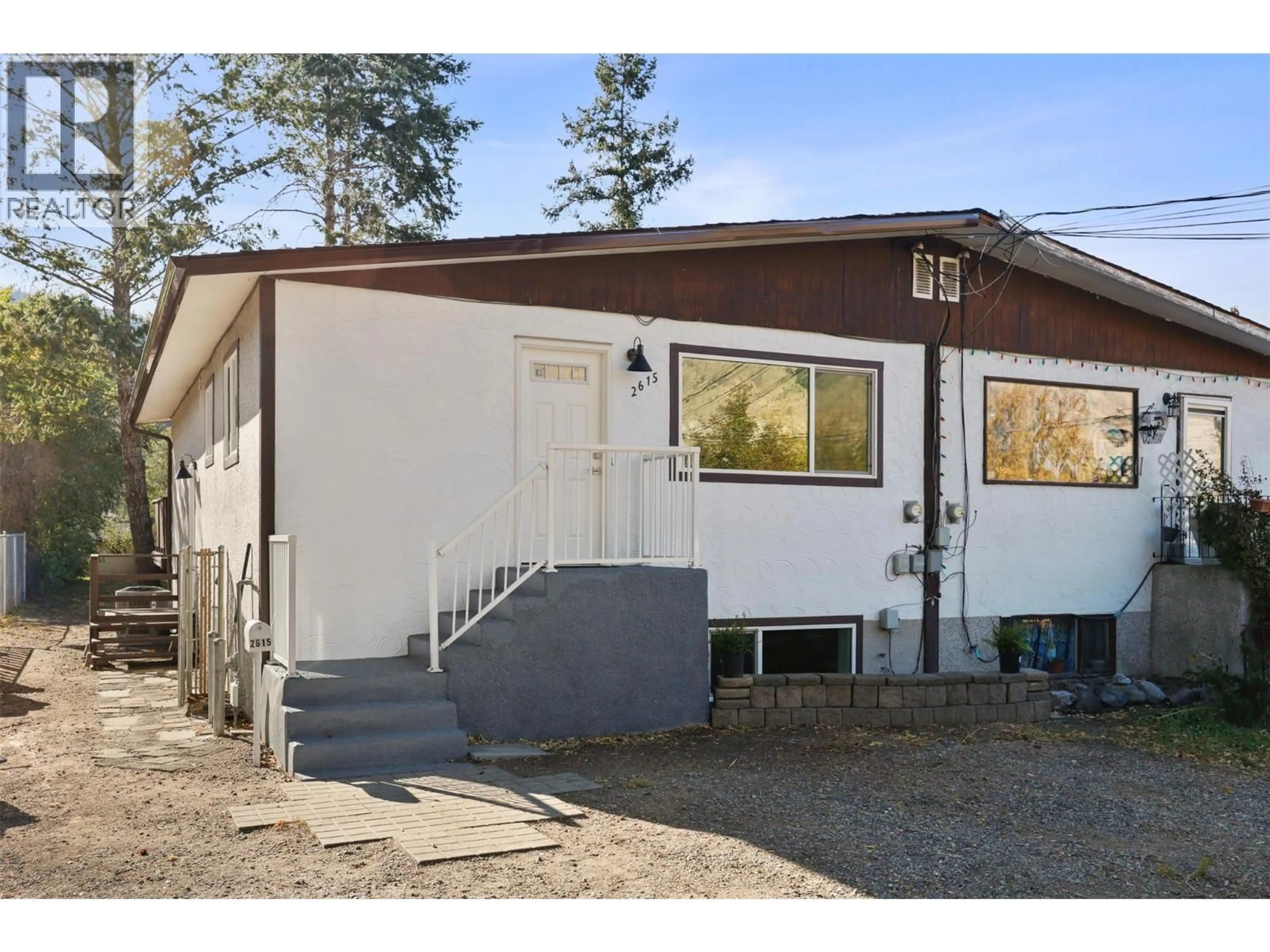Home with vinyl exterior material, street for 2615 THOMPSON DRIVE, Kamloops British Columbia V2C4L5