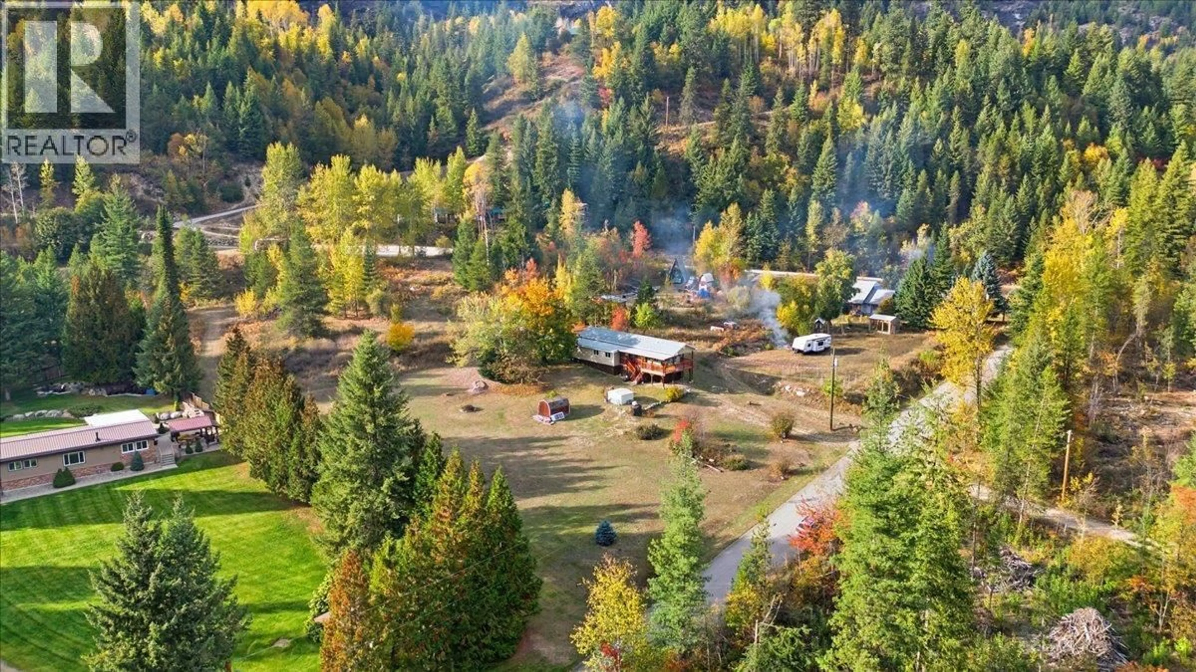 A pic from outside/outdoor area/front of a property/back of a property/a pic from drone, forest/trees view for 2413 DOUKHOBOUR ROAD, Castlegar British Columbia V1N4P2