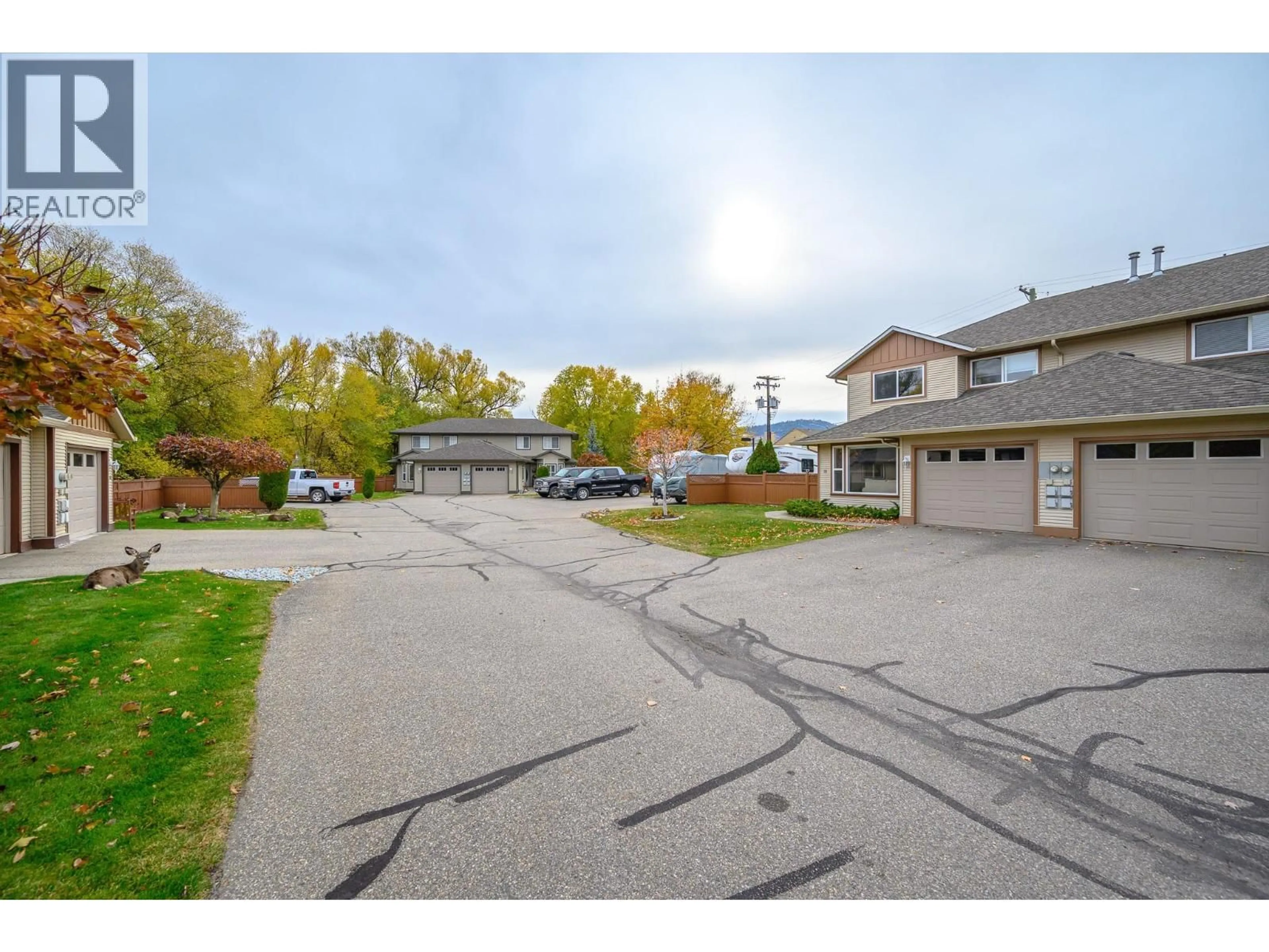 A pic from outside/outdoor area/front of a property/back of a property/a pic from drone, street for 19 - 5200 25TH AVE OTHER, Vernon British Columbia V1T9V6