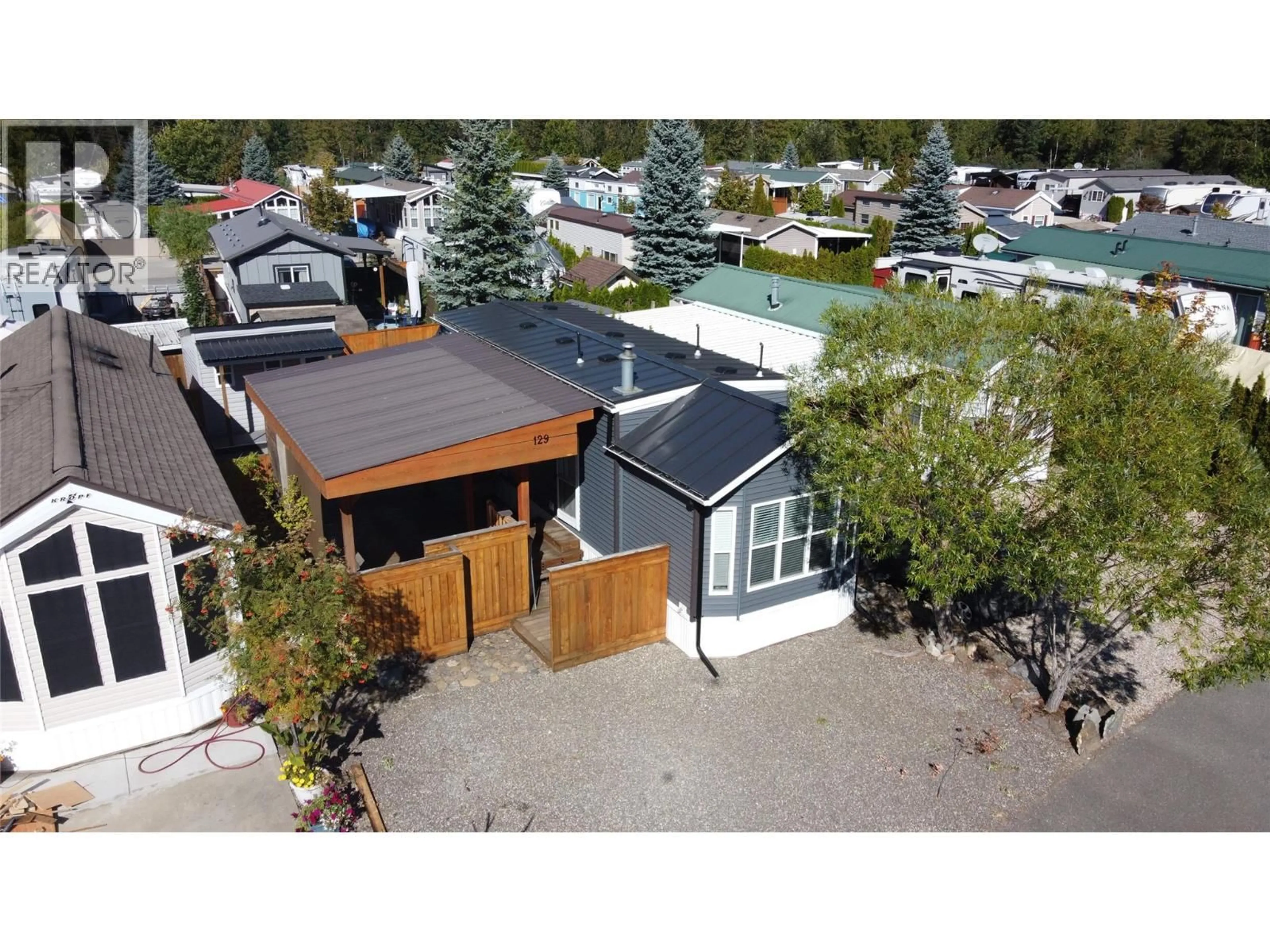 A pic from outside/outdoor area/front of a property/back of a property/a pic from drone, street for 129 - 1383 SILVER SANDS ROAD, Sicamous British Columbia V0E2V4