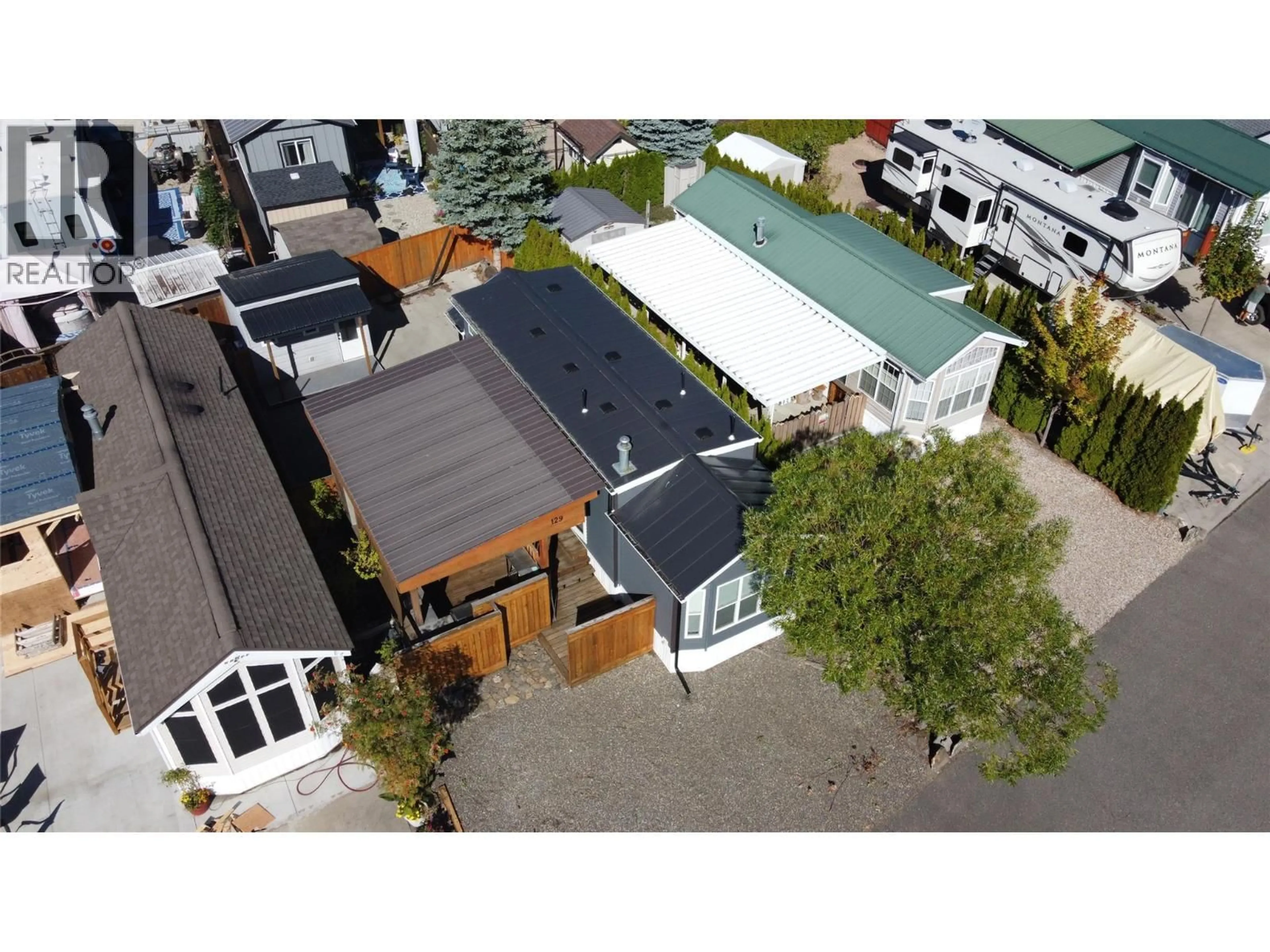 A pic from outside/outdoor area/front of a property/back of a property/a pic from drone, street for 129 - 1383 SILVER SANDS ROAD, Sicamous British Columbia V0E2V4