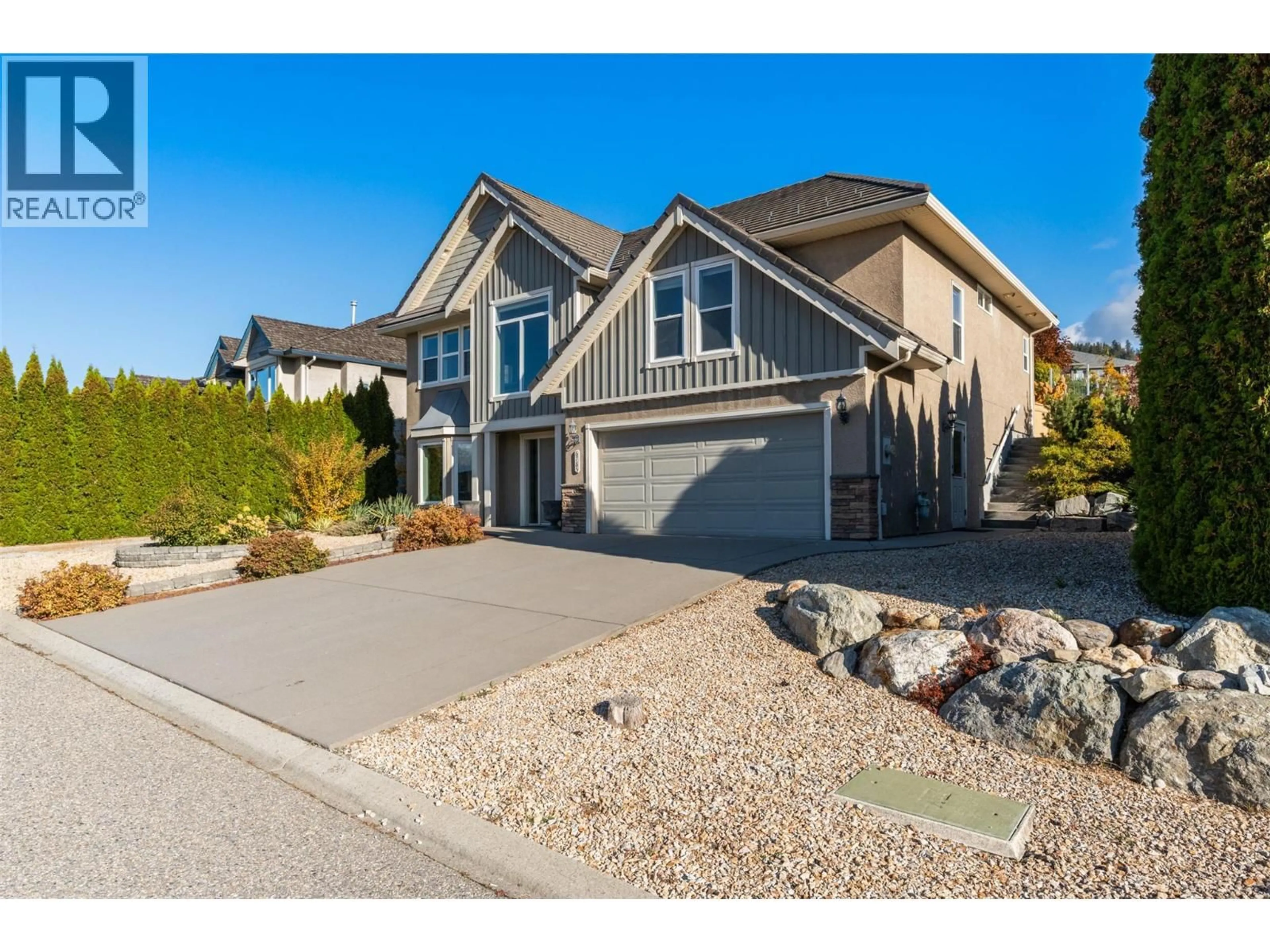 Home with vinyl exterior material, street for 6785 FOOTHILLS DRIVE, Vernon British Columbia V1B3W2