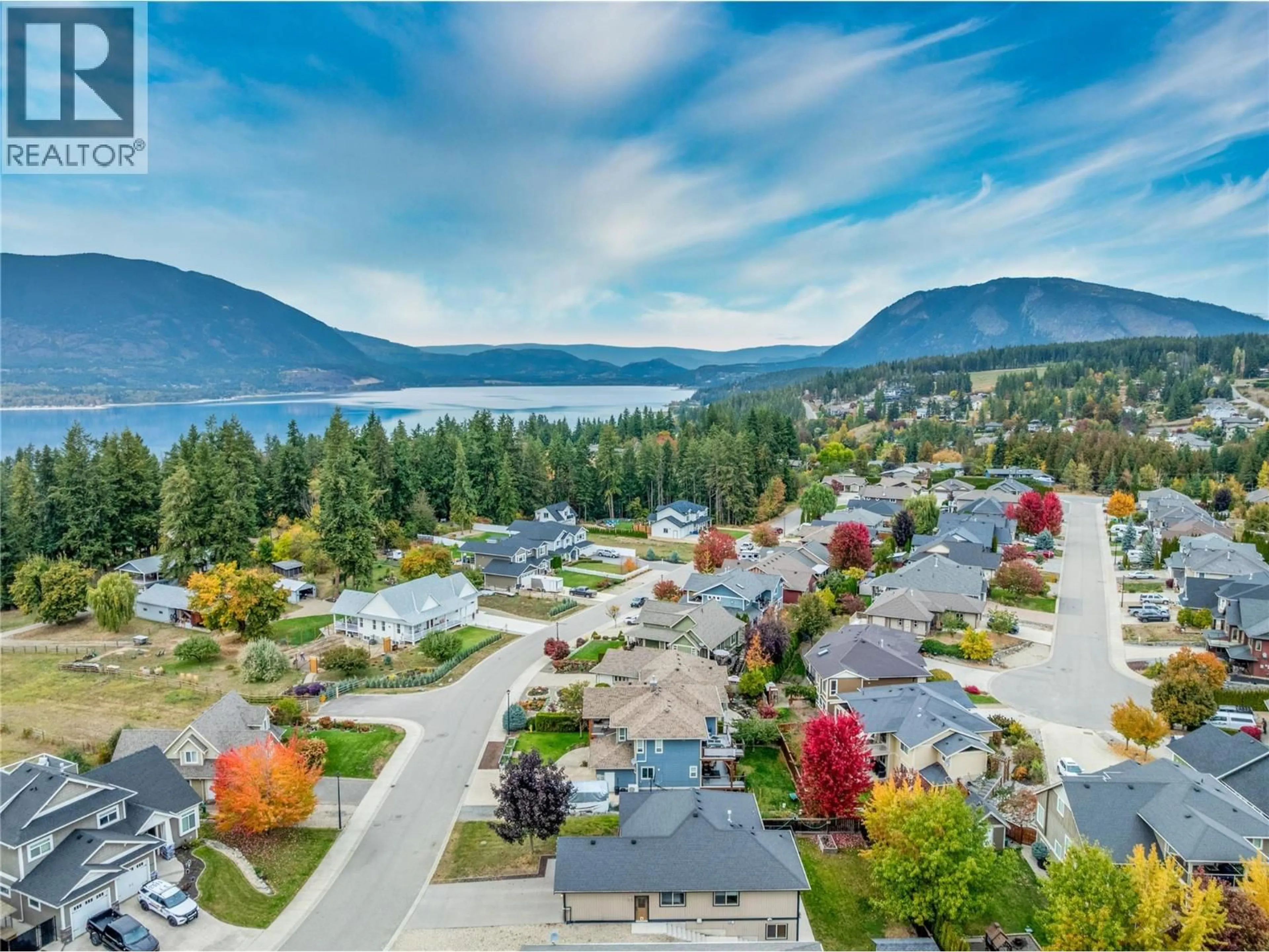 A pic from outside/outdoor area/front of a property/back of a property/a pic from drone, water/lake/river/ocean view for 1660 22 STREET NORTHEAST, Salmon Arm British Columbia V1E0A8
