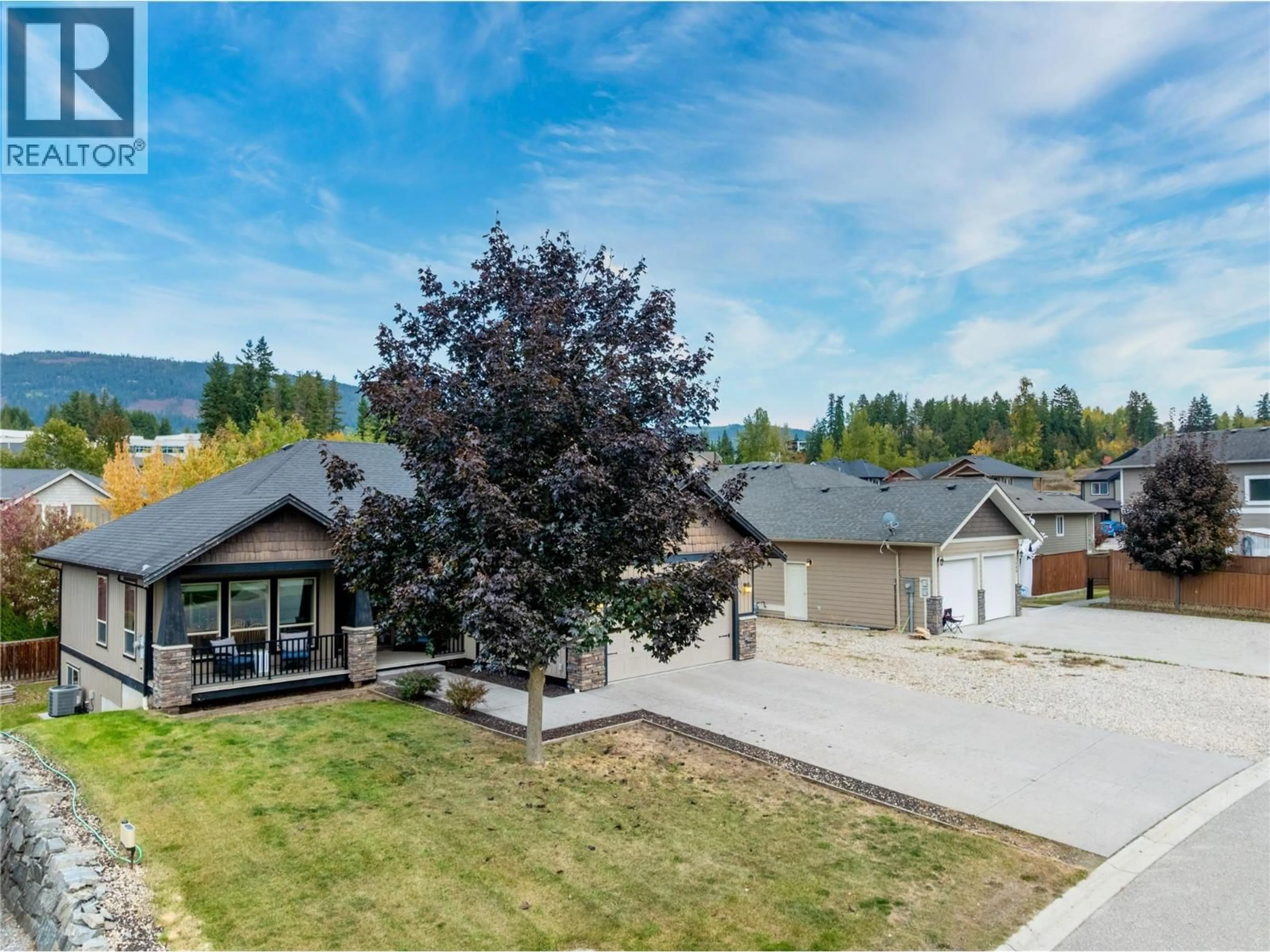 A pic from outside/outdoor area/front of a property/back of a property/a pic from drone, mountain view for 1660 22 STREET NORTHEAST, Salmon Arm British Columbia V1E0A8