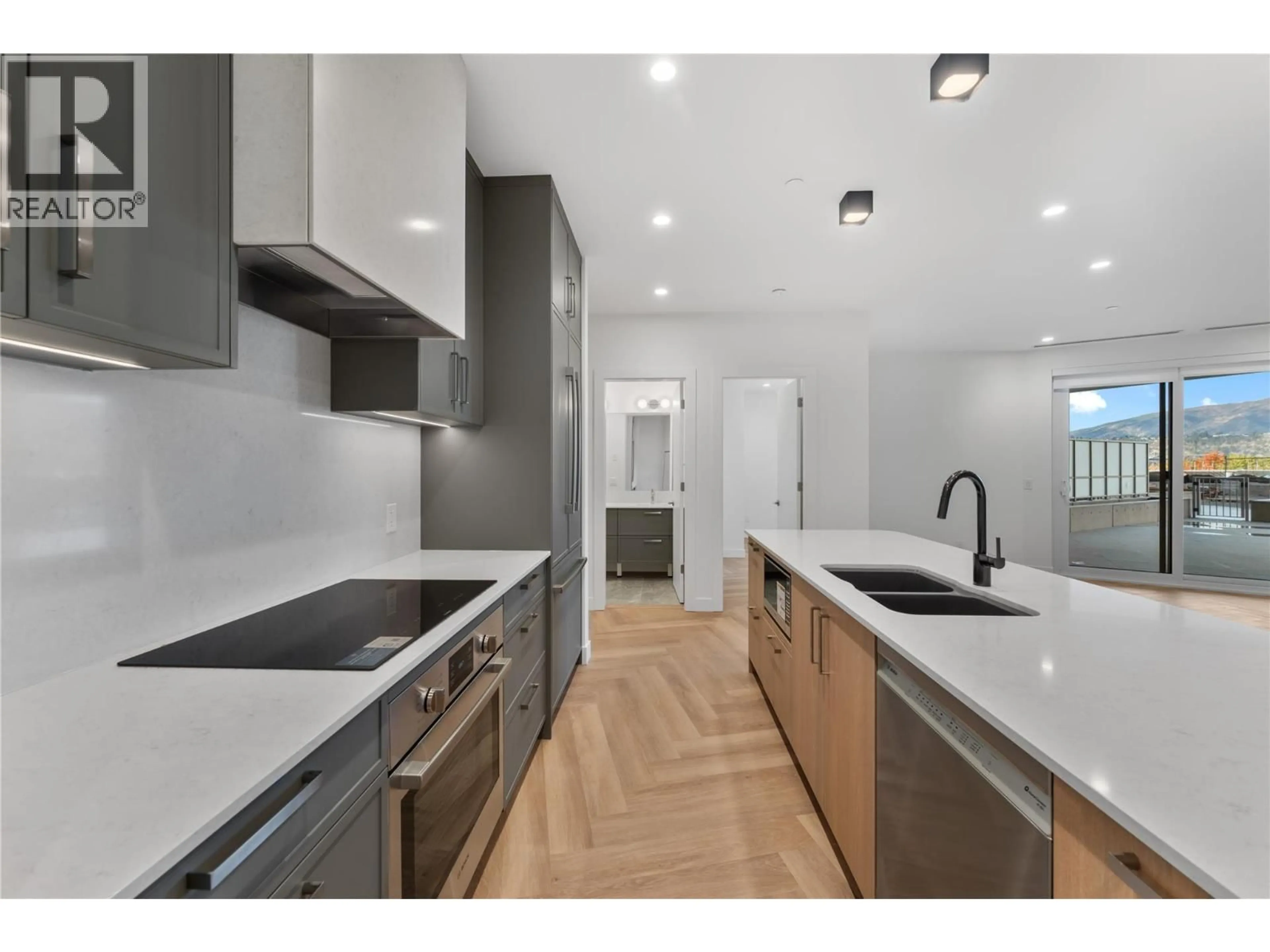 Open concept kitchen, unknown for 414 - 3340 LAKESHORE DRIVE, Kelowna British Columbia V1W0H6