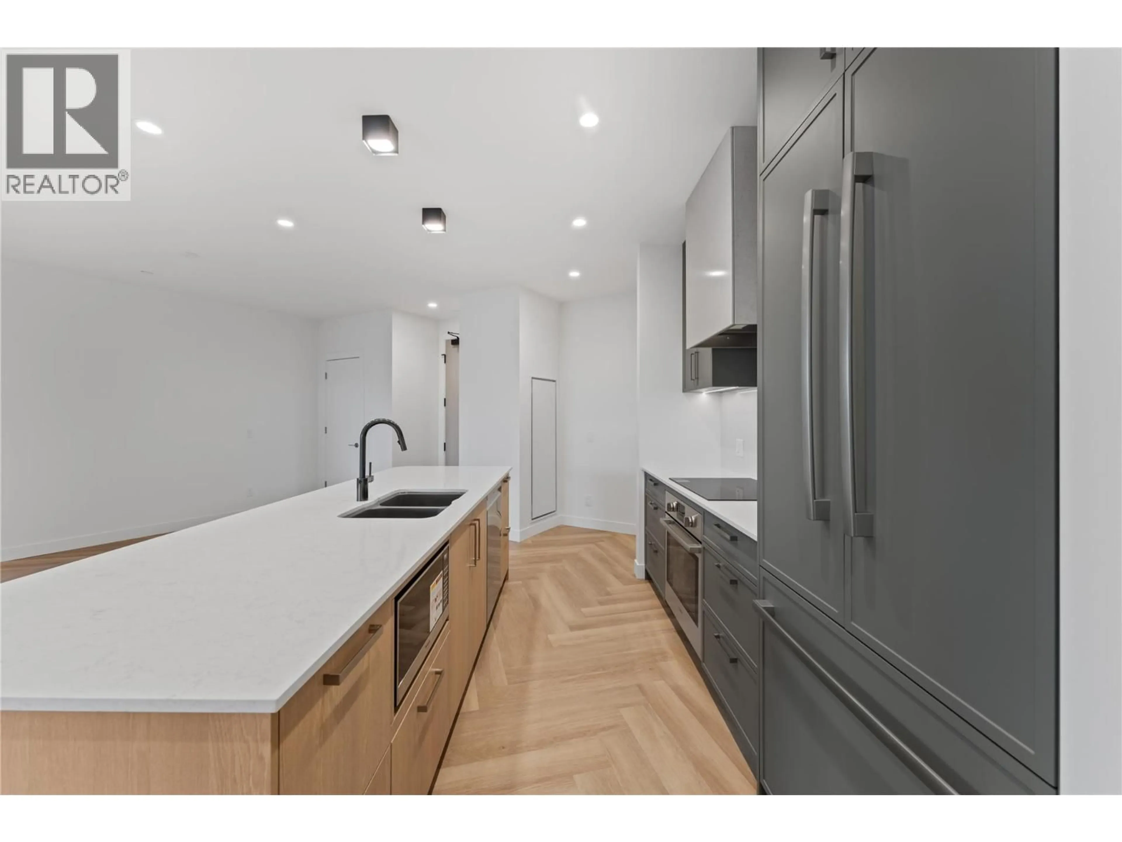 Open concept kitchen, unknown for 414 - 3340 LAKESHORE DRIVE, Kelowna British Columbia V1W0H6
