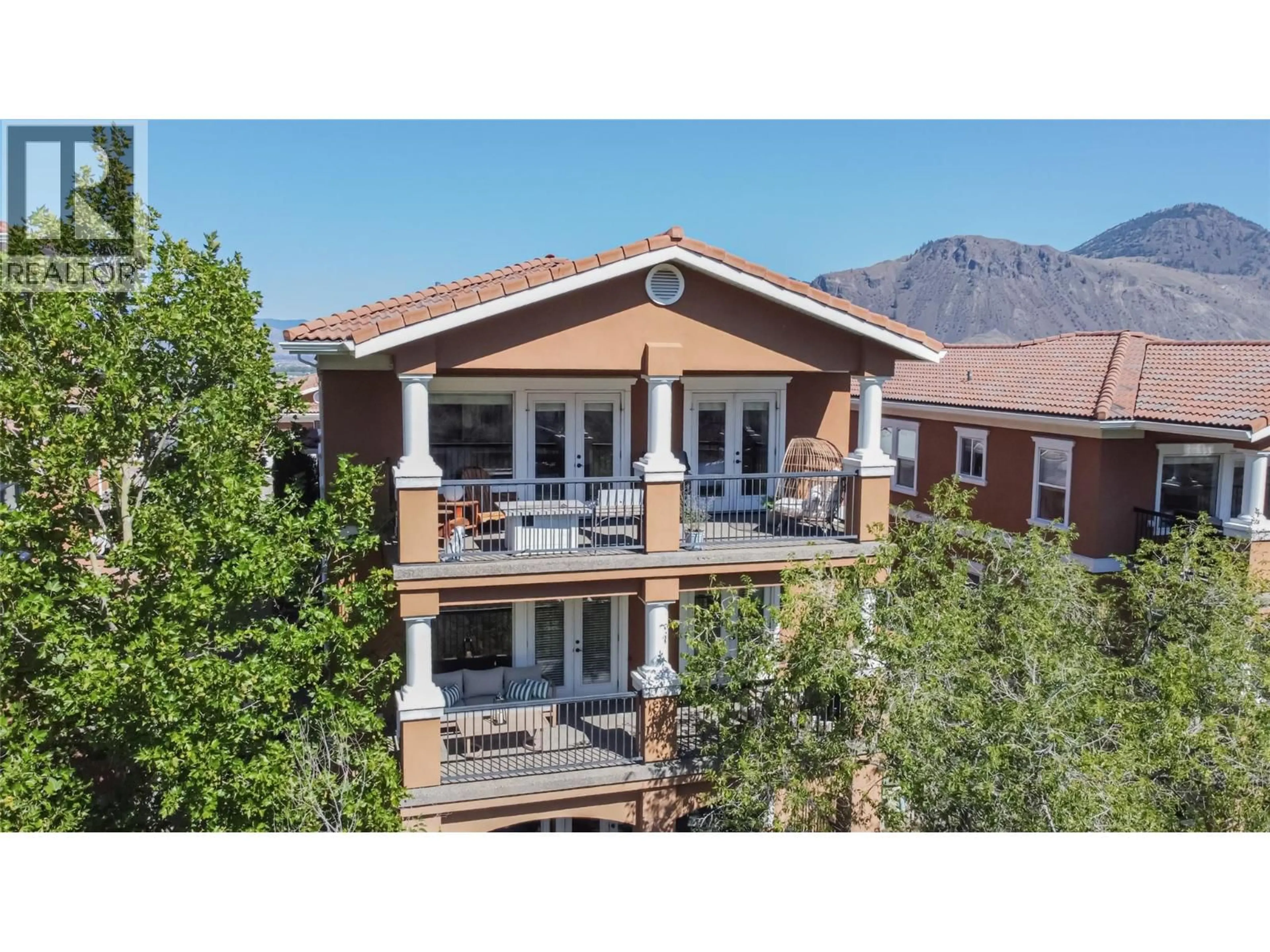 A pic from outside/outdoor area/front of a property/back of a property/a pic from drone, mountain view for 13 - 875 SAHALI TERRACE, Kamloops British Columbia V2C6W8