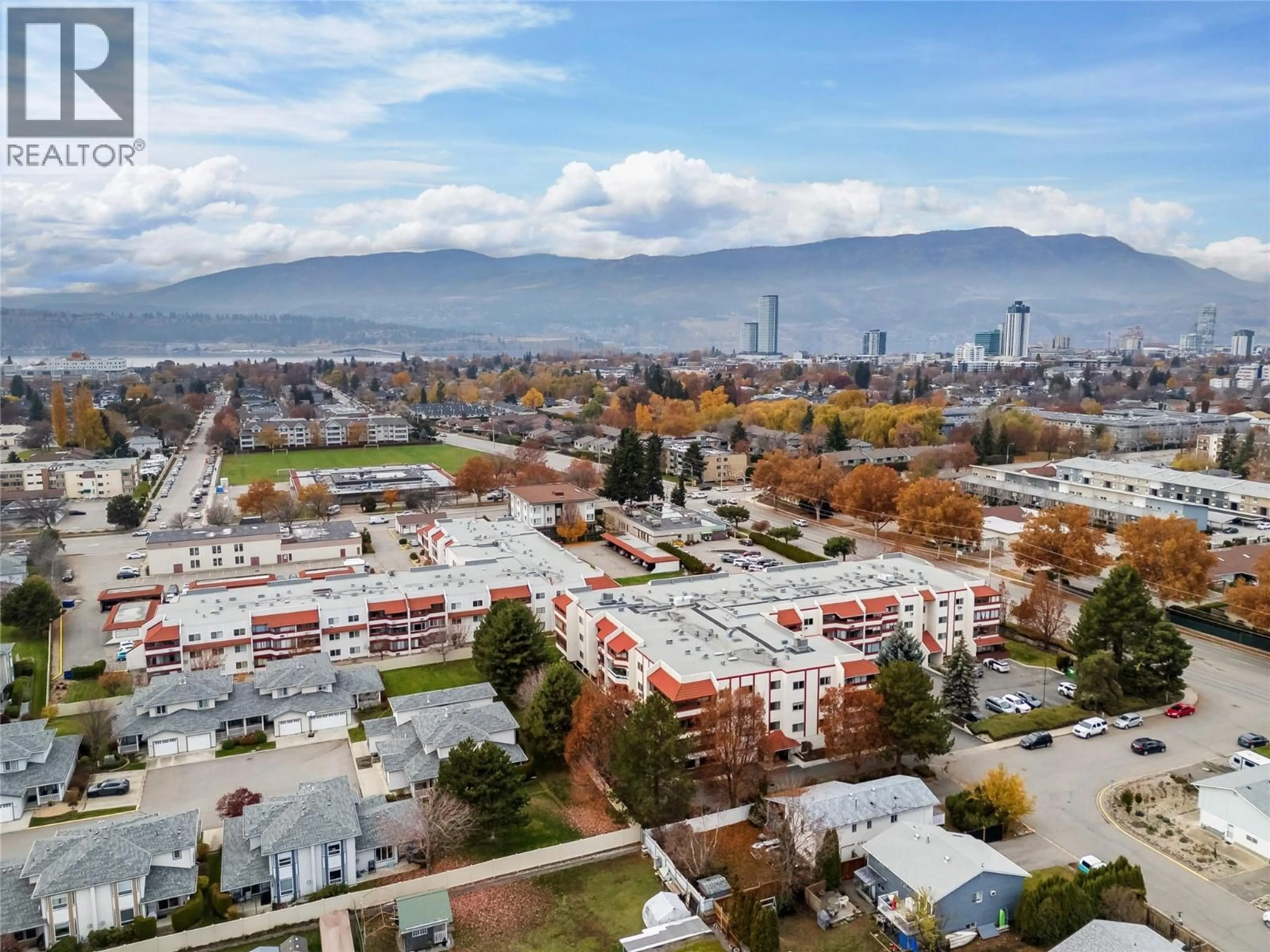 A pic from outside/outdoor area/front of a property/back of a property/a pic from drone, mountain view for 306 - 2110 HOY STREET, Kelowna British Columbia V1Y8T4