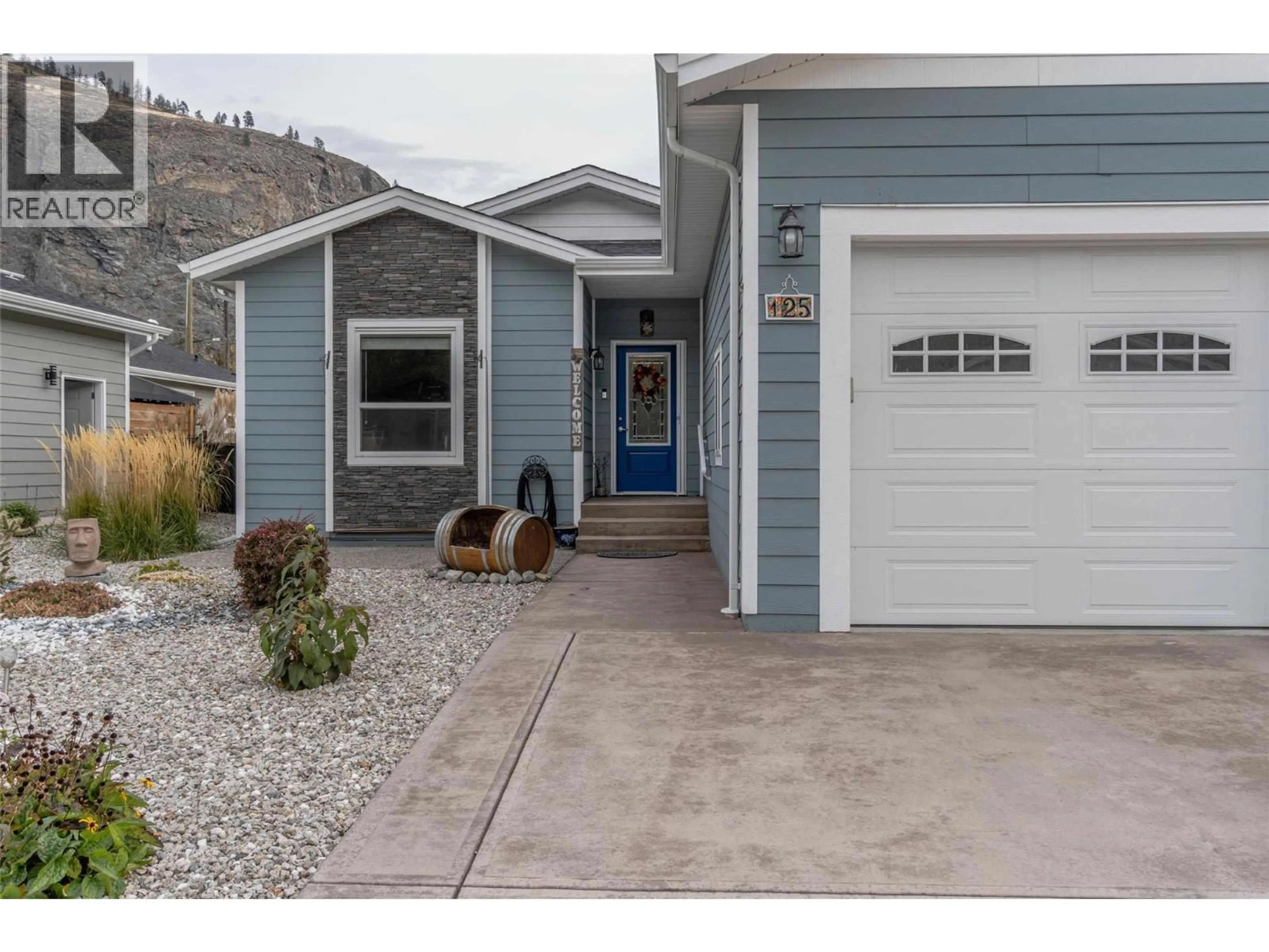 Home with vinyl exterior material, street for 125 - 8300 GALLAGHER LAKE FRONTAGE ROAD, Oliver British Columbia V0H1T2